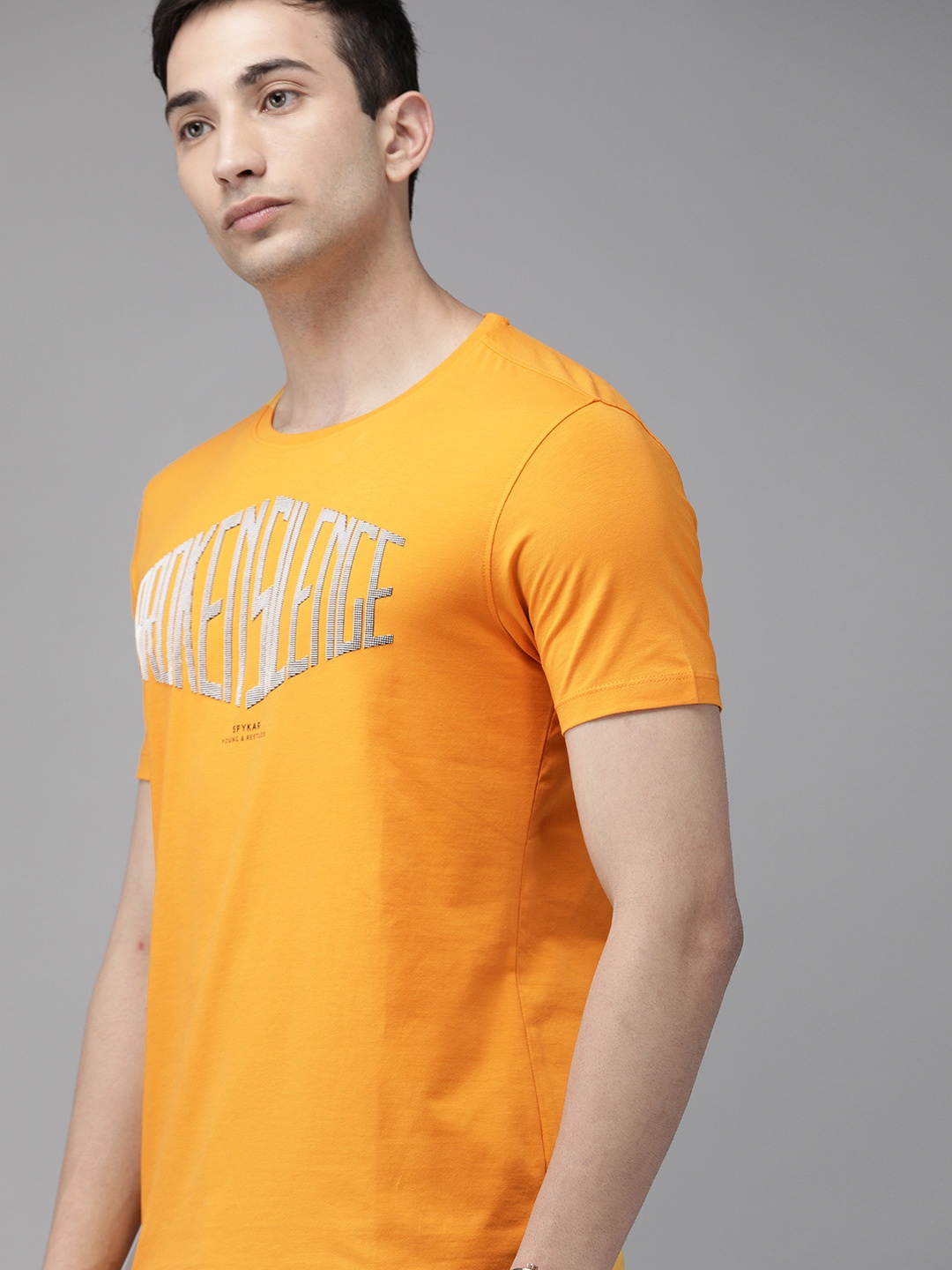 

SPYKAR Men Yellow Self Design Round Neck T-shirt