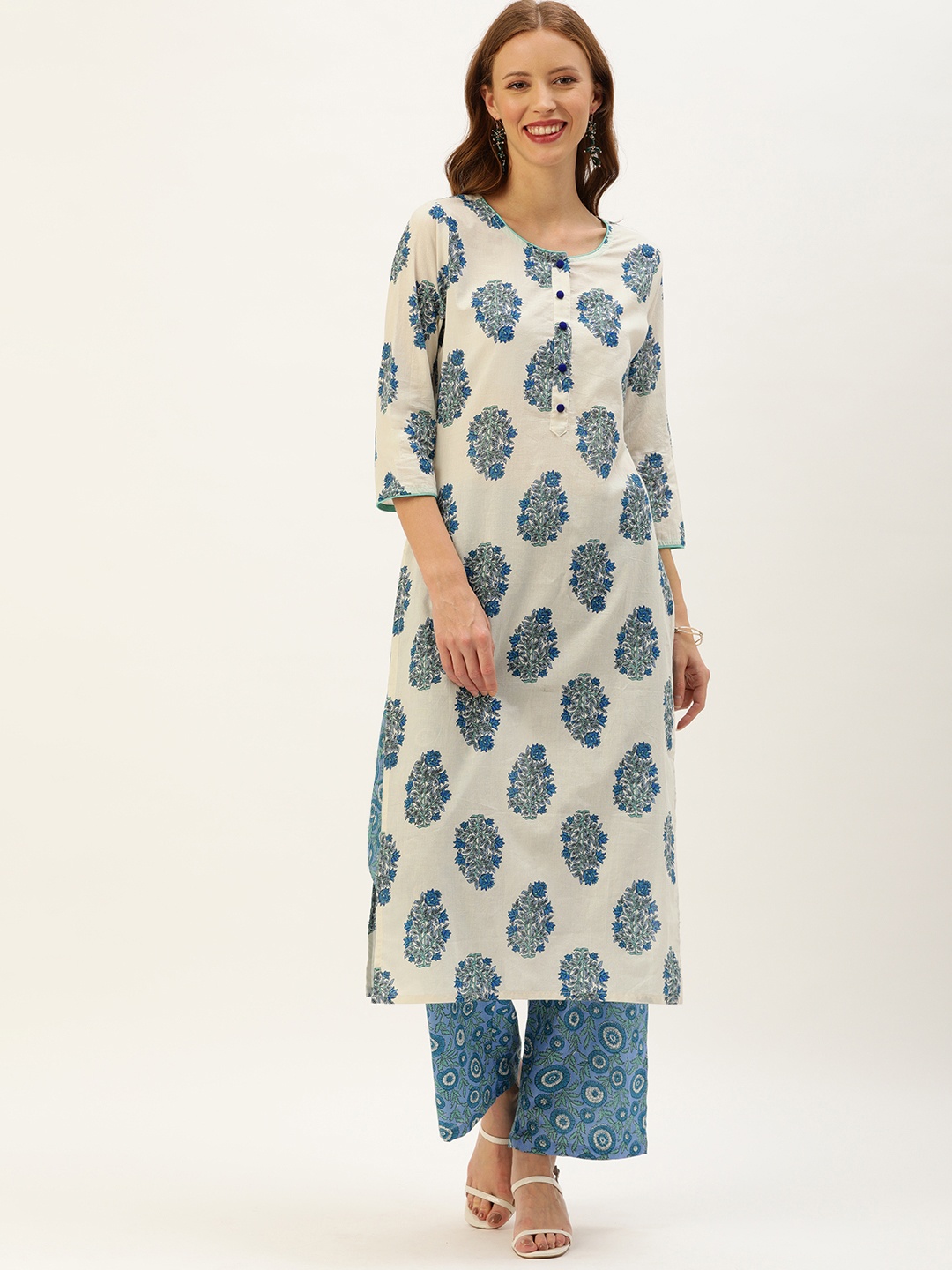 

Rajnandini Women Off-White & Blue Floral Printed Kurta with Palazzos