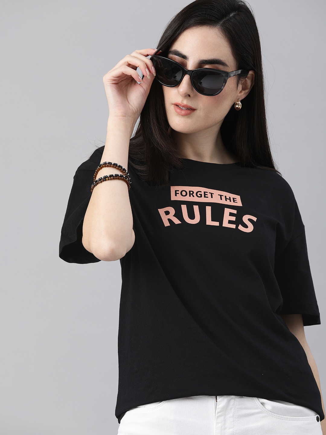 

The Roadster Lifestyle Co Women Black Typography Printed Drop-Shoulder Sleeves Pure Cotton T-shirt