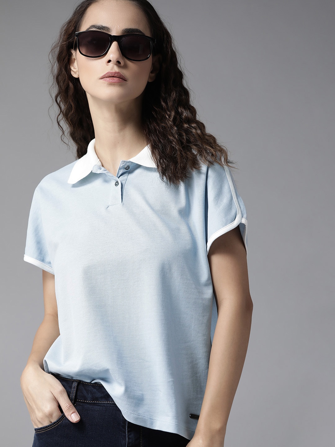 

The Roadster Lifestyle Co Women Blue Solid Cotton Polo Collar T-shirt