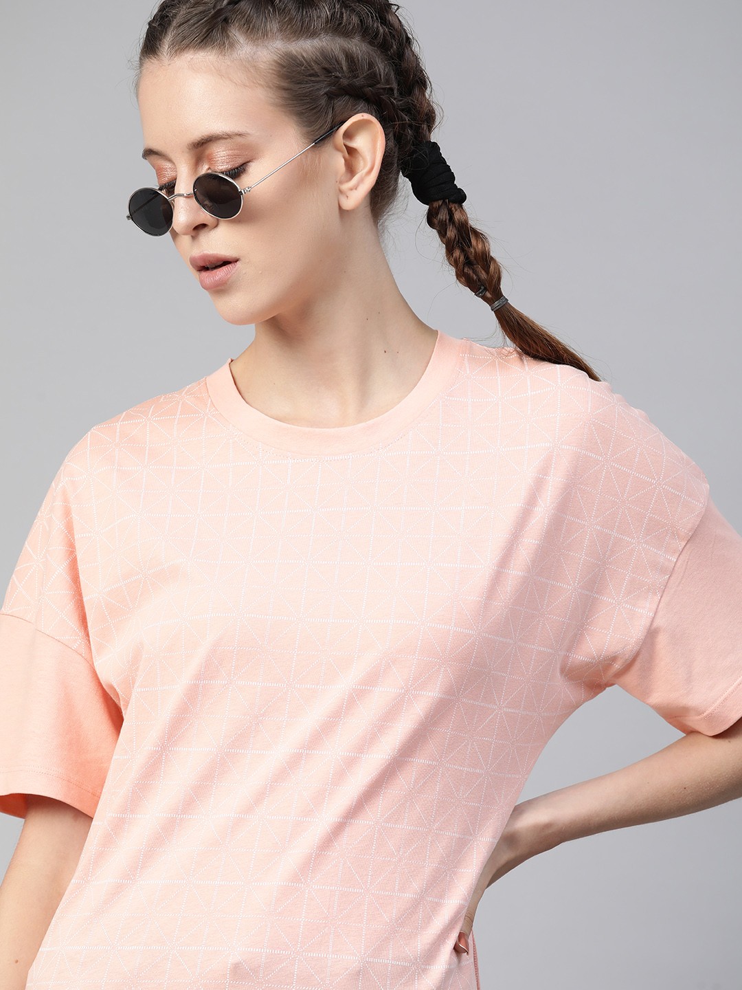 

The Roadster Lifestyle Co Women Peach-Colored Printed Pure Cotton Drop-Shoulder Sleeves Pure Cotton T-shirt