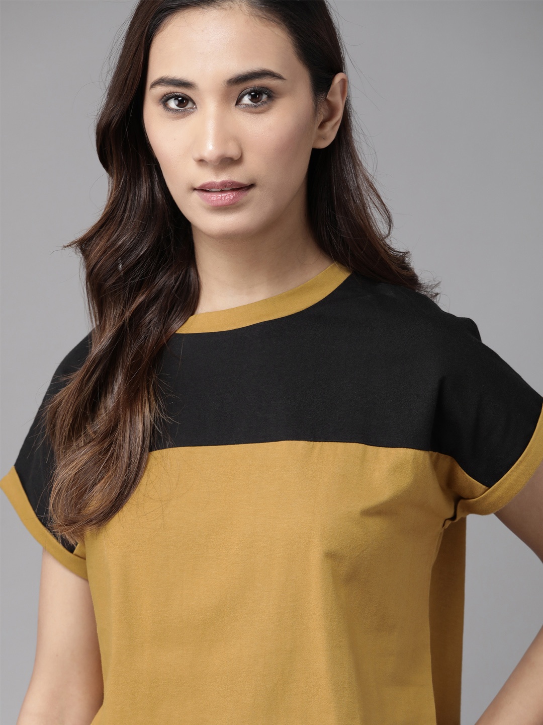 

The Roadster Lifestyle Co Women Mustard Yellow Black Colourblocked Round Neck Pure Cotton T-shirt