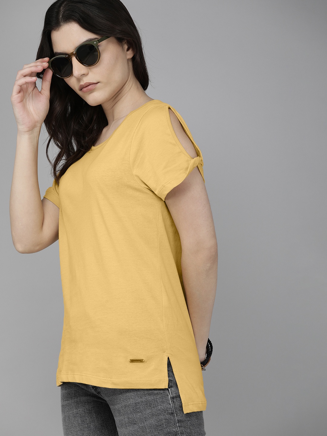 

The Roadster Lifestyle Co Women Yellow Solid Round Neck Pure Cotton T-shirt with Slit Sleeves