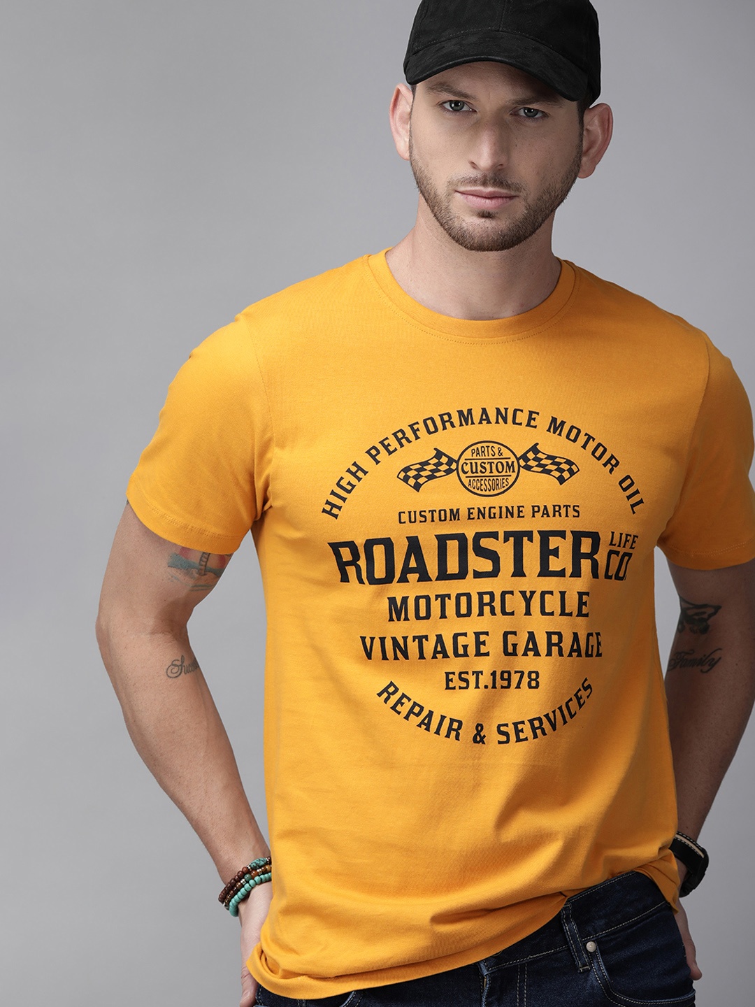 

The Roadster Lifestyle Co Men Mustard Yellow Brand Logo Printed Round Neck Pure Cotton T-shirt