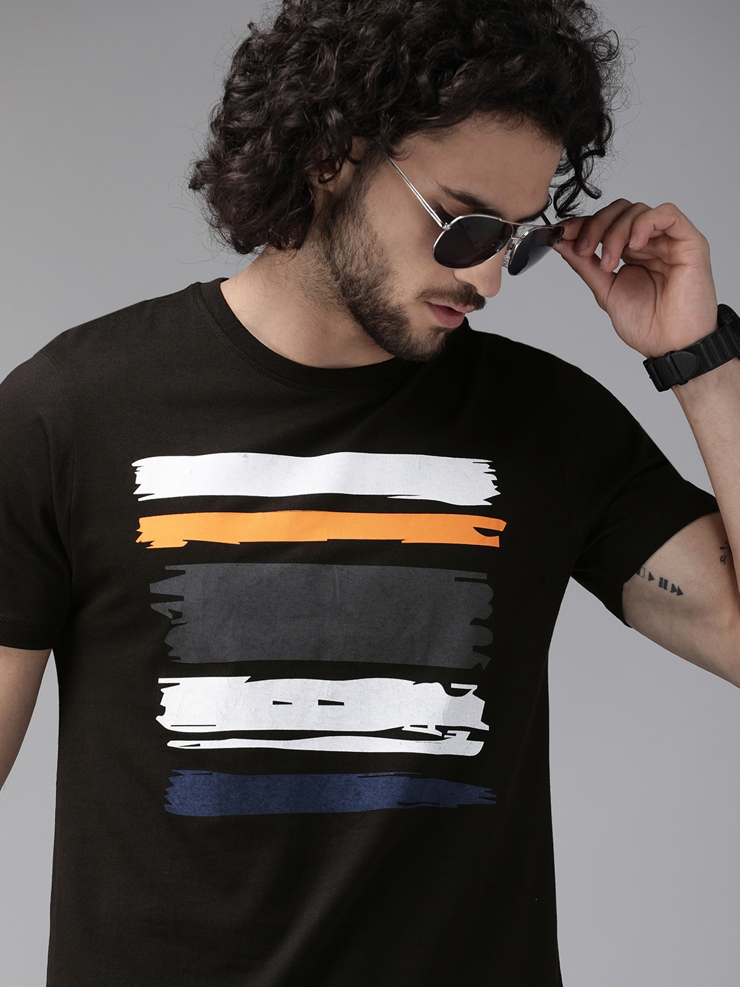 

The Roadster Lifestyle Co Men Black Striped Round Neck T-shirt
