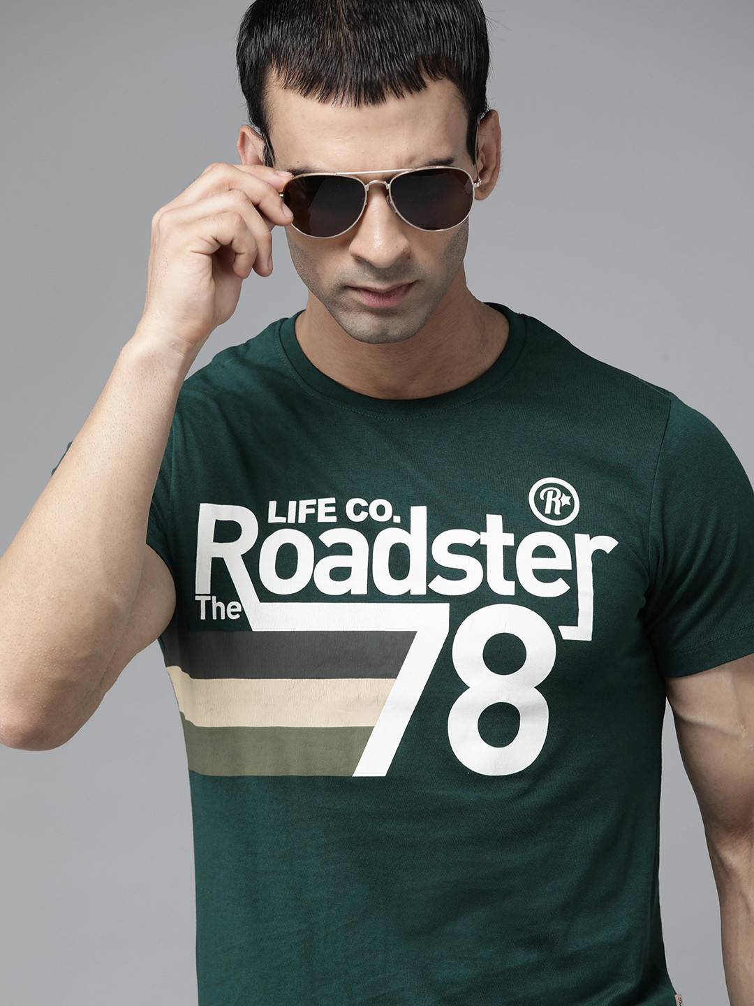 

The Roadster Lifestyle Co Men Green White Pure Cotton Brand Logo Printed Pure Cotton T-shirt