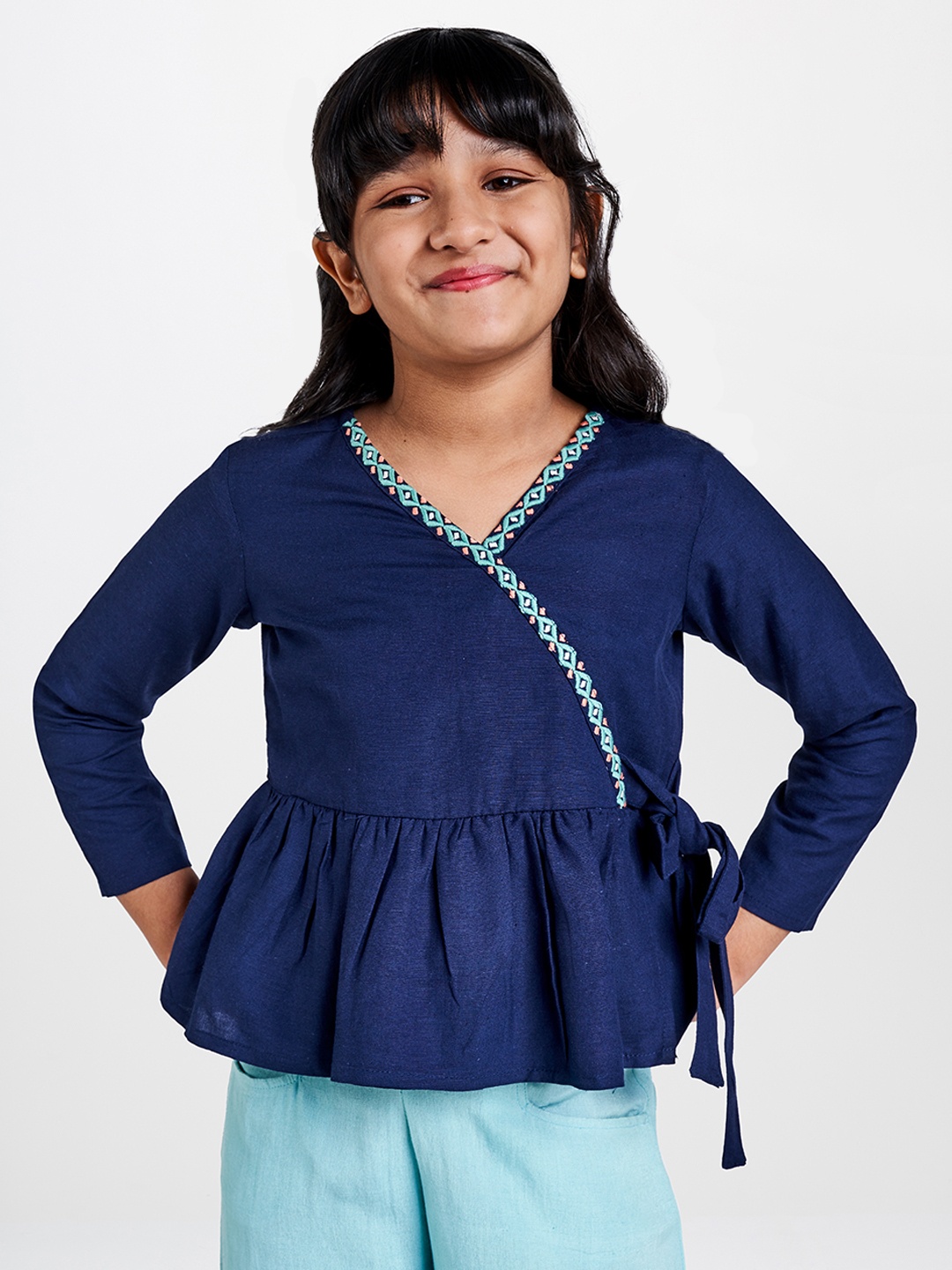 

Global Desi Blue Solid Wrap Top