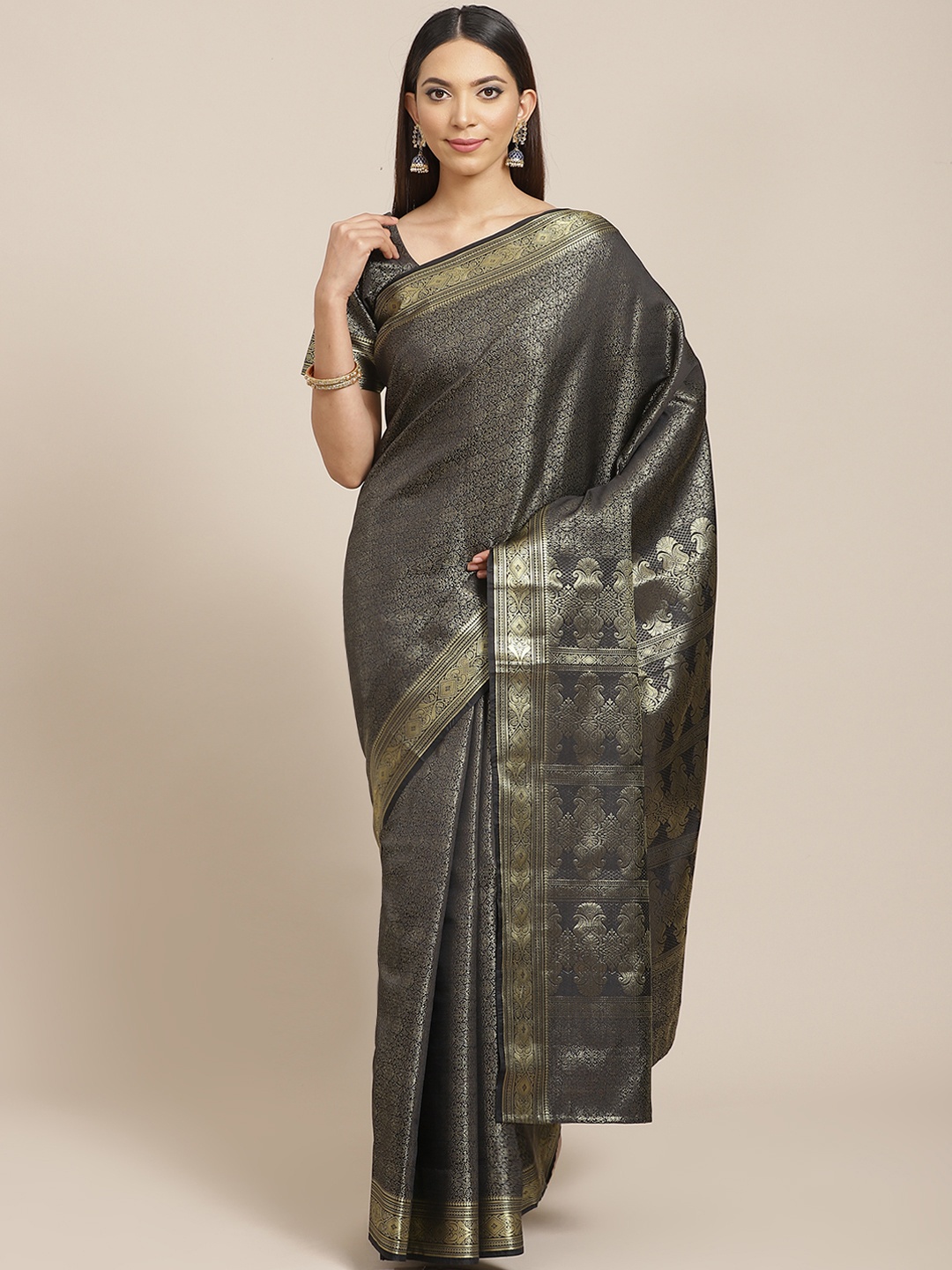 

Libas Black & Golden Woven Design Saree
