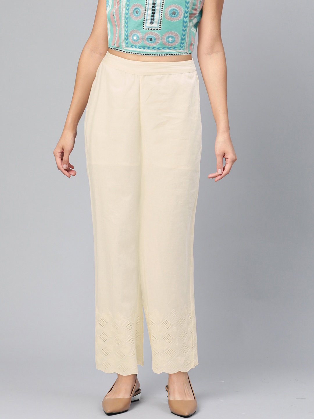 

Global Desi Women Beige Regular Fit Solid Parallel Trousers