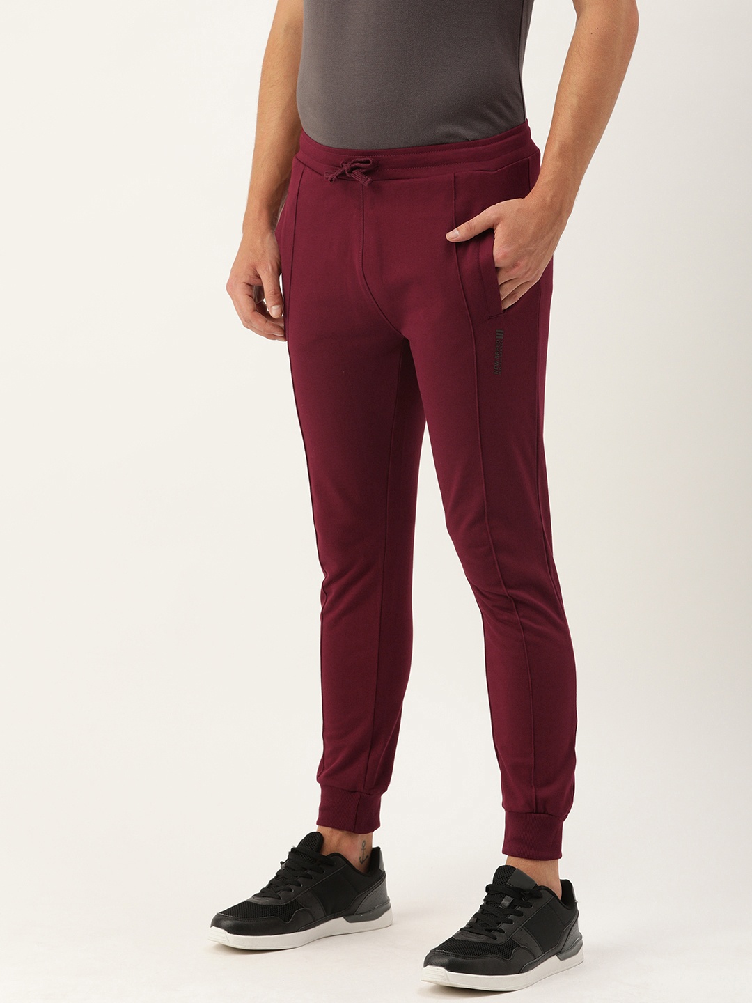 

The Indian Garage Co Men's Burgundy Solid Track Pants