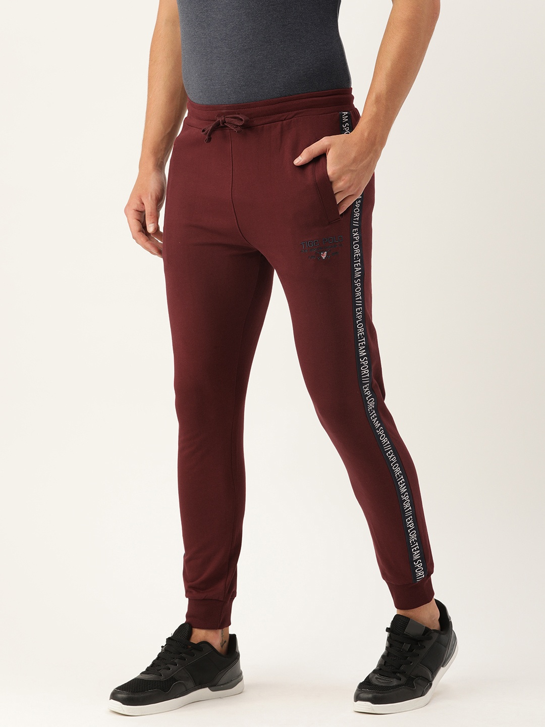 

The Indian Garage Co Men Burgundy Solid Slim Fit Jogger with Side Stripes