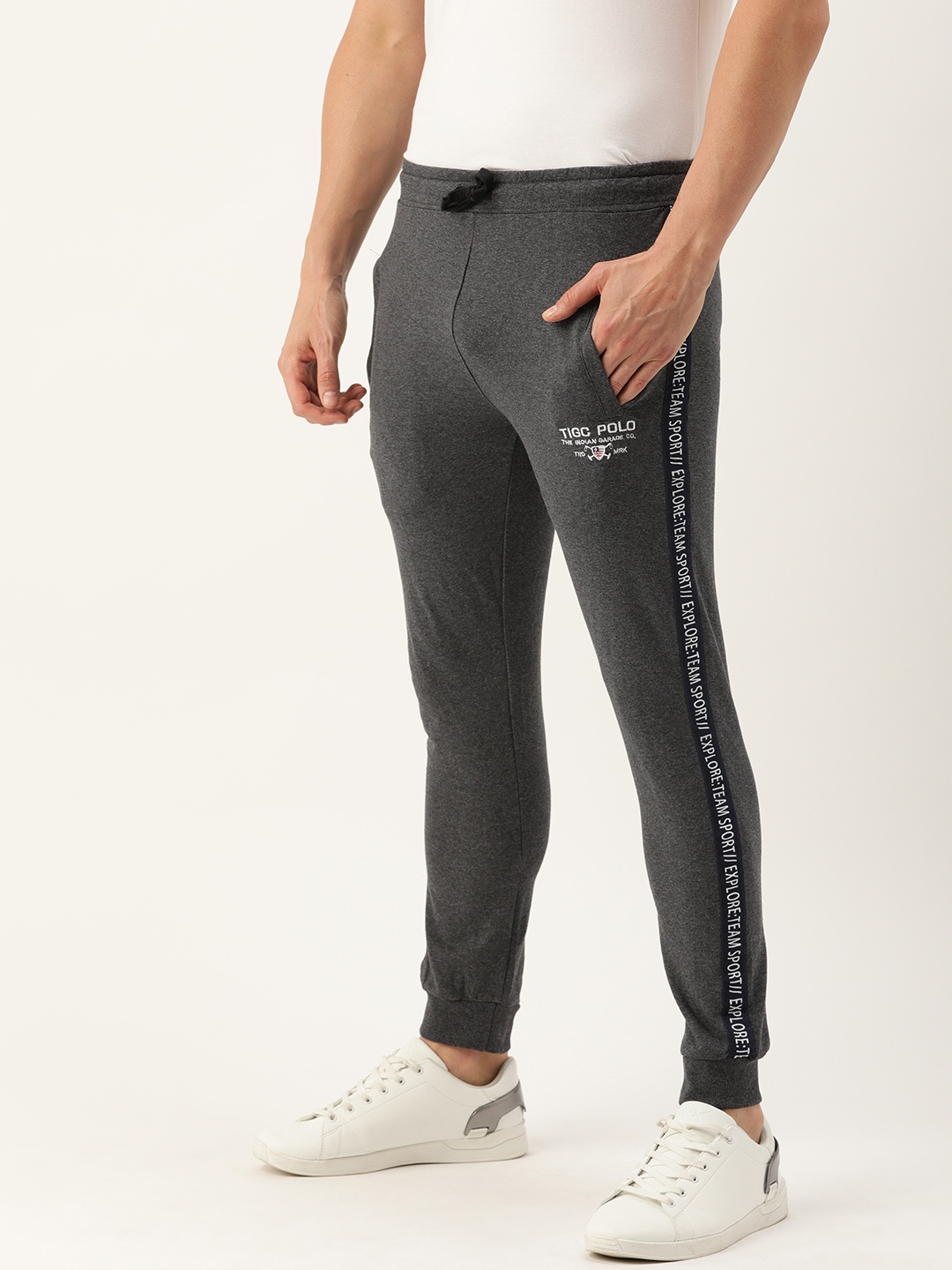 

The Indian Garage Co Men Grey Melange Solid Joggers with Side Tape Printed Detail