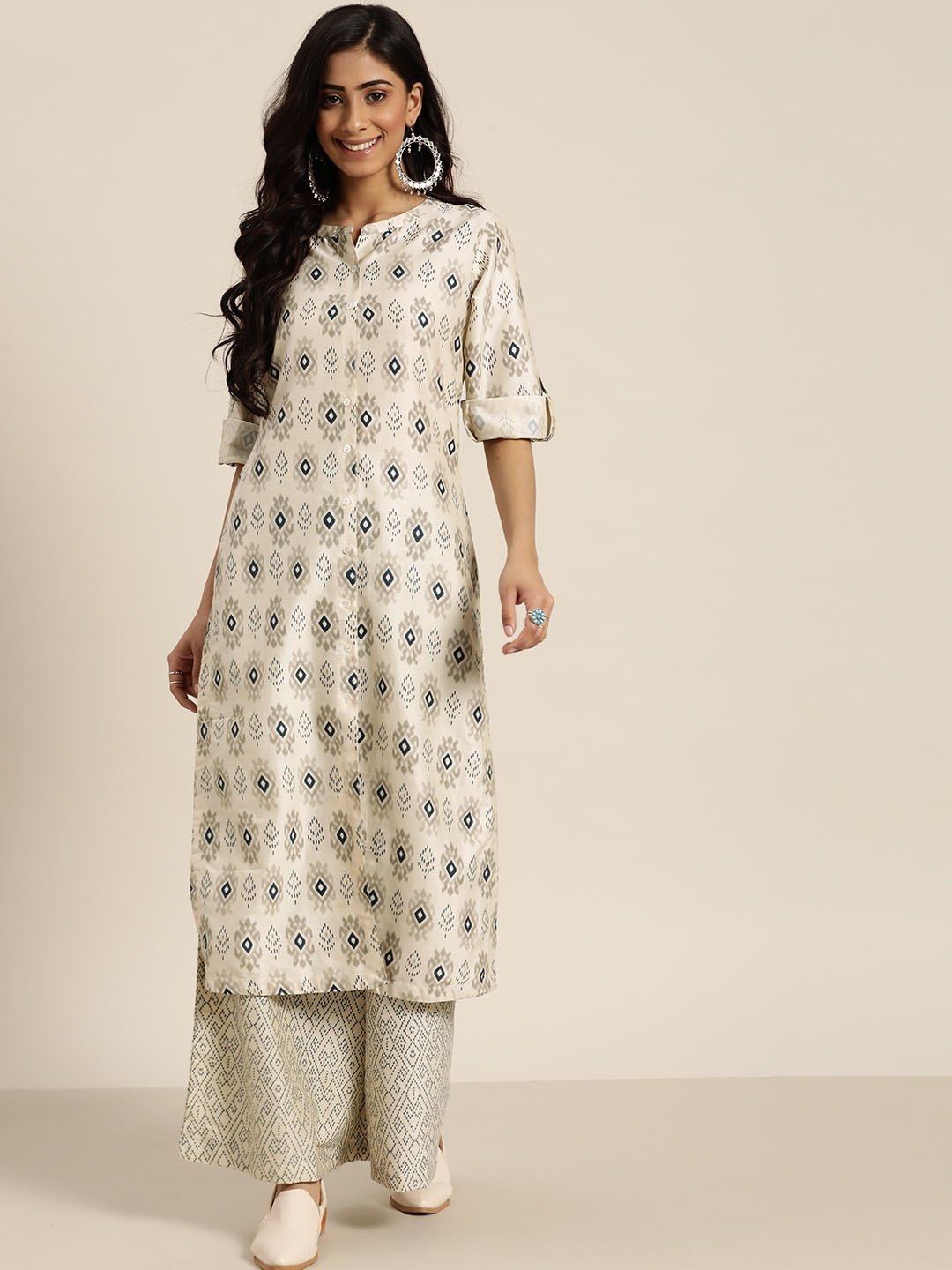 

Sangria Women Beige & Navy Blue Ethnic Printed Straight Kurta with Palazzos