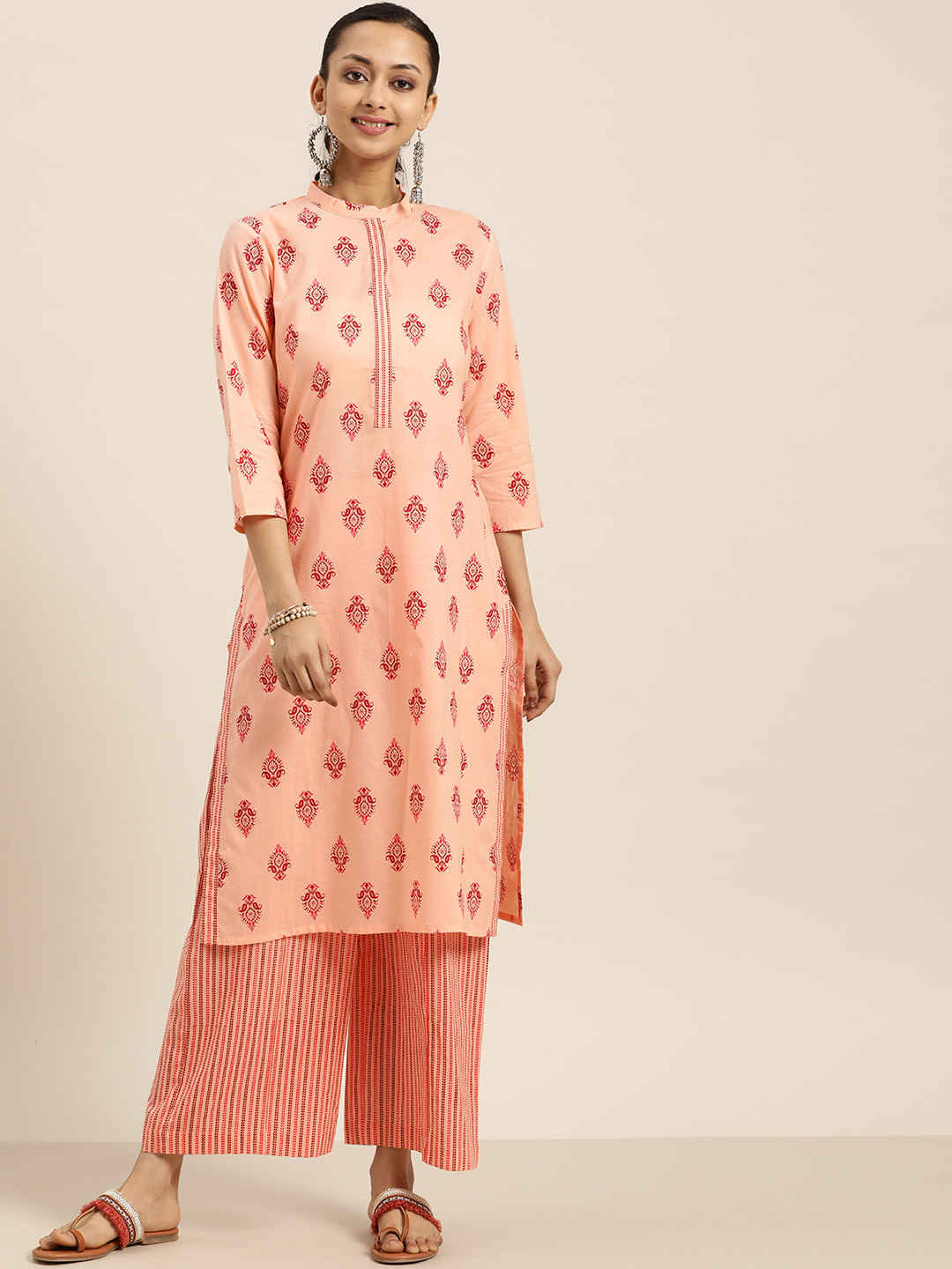 

Sangria Women Peach-Coloured & Red Ethnic Print Cotton Kurta with Palazzos