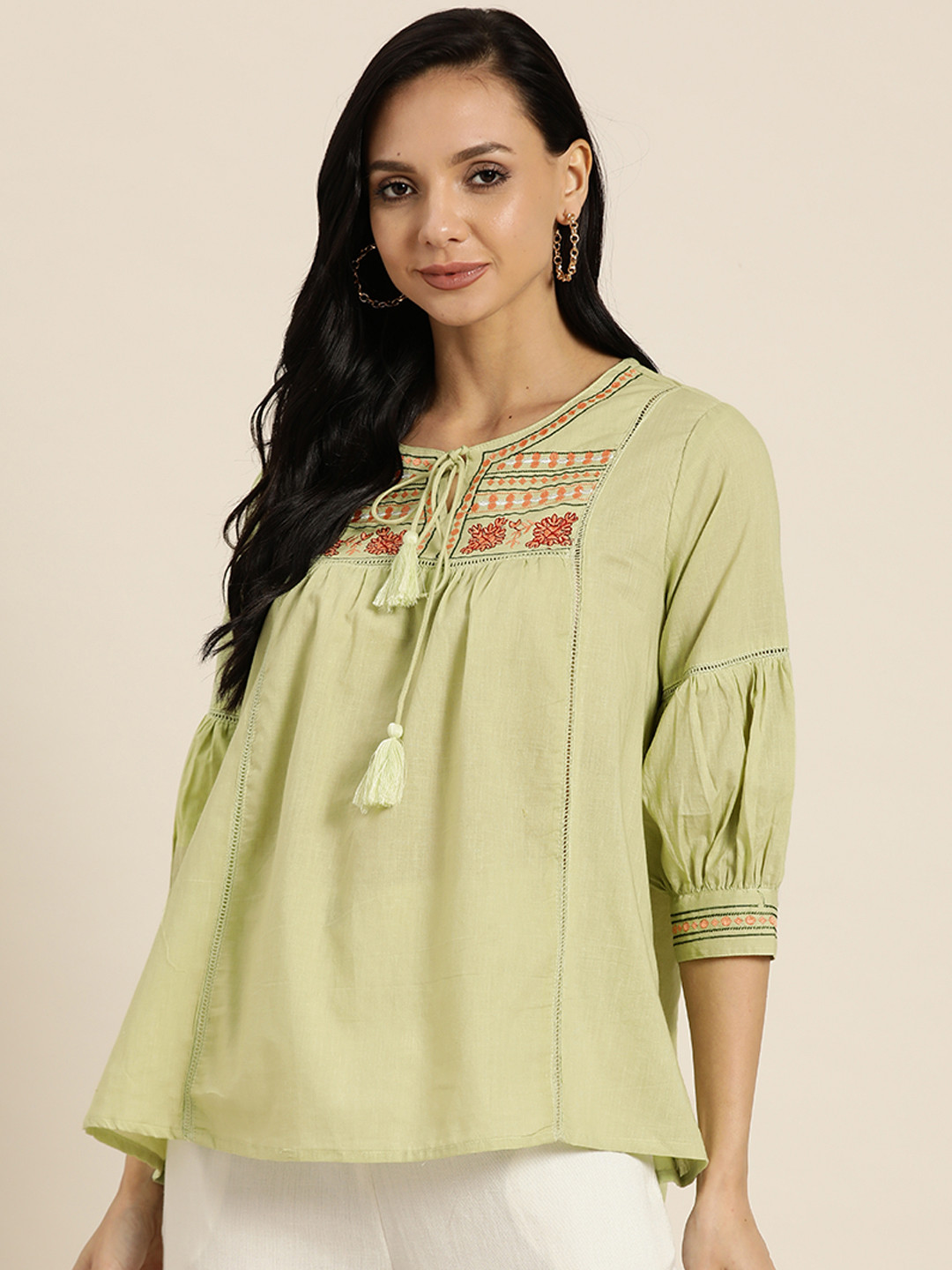 

Sangria Women Green & Orange Embroidered Pure Cotton Tie-Up Neck A-Line Top