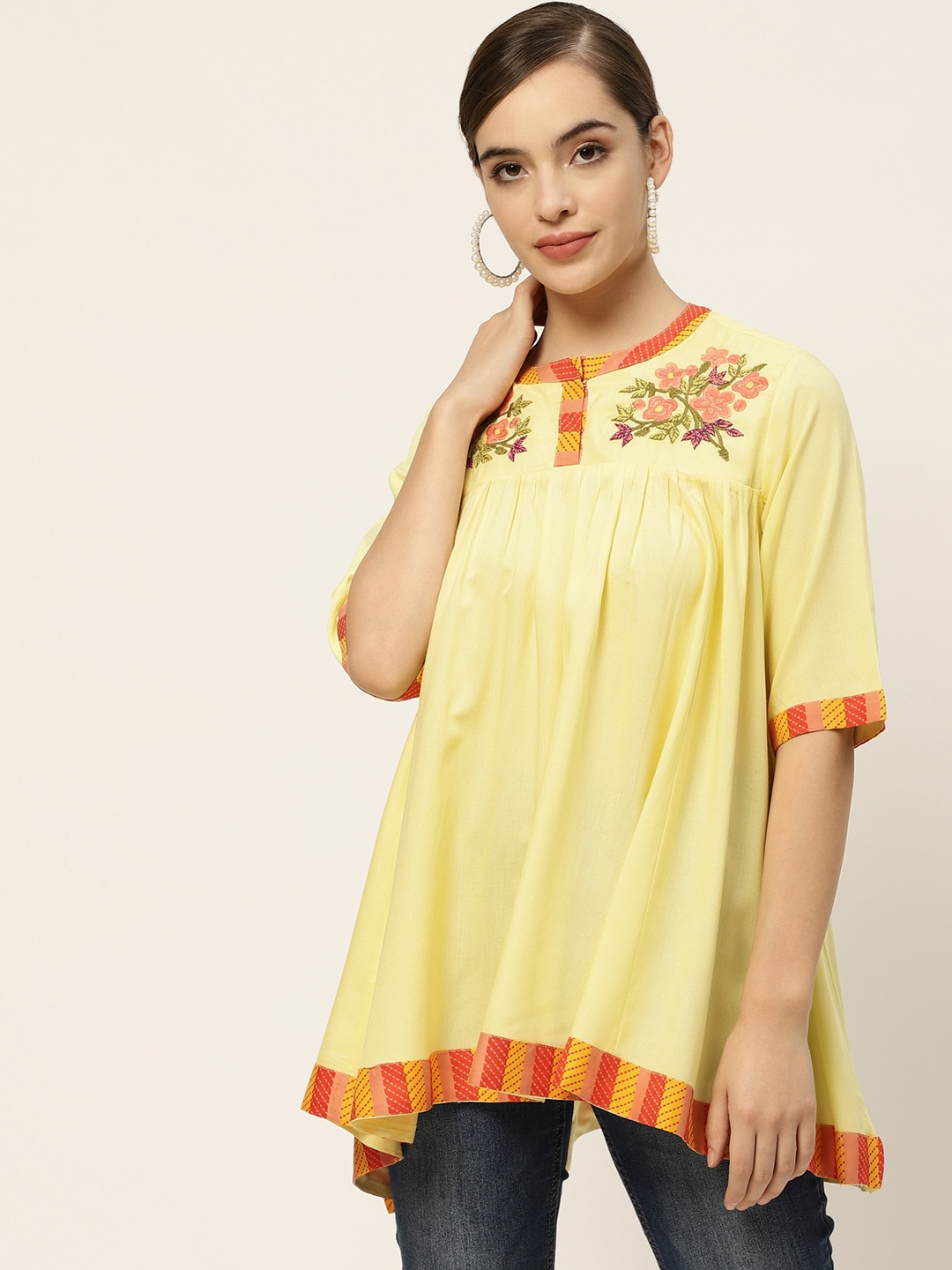 

Sangria Yellow Floral Embroidered A-Line Top