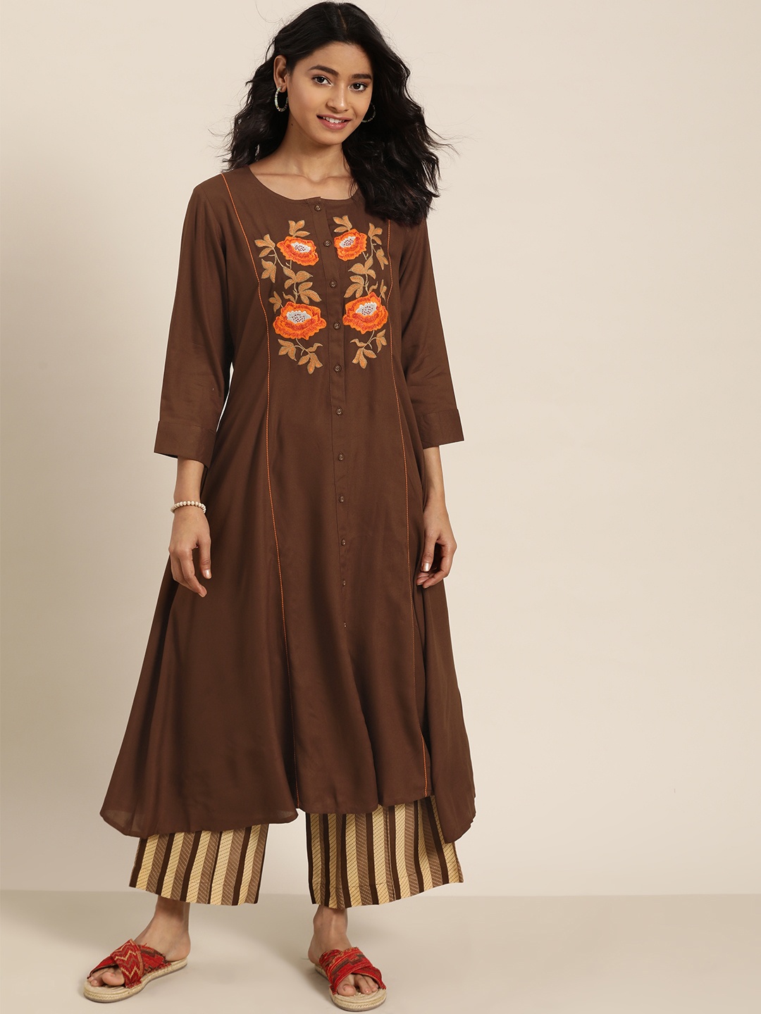 

Sangria Women Coffee Brown & Beige Embroidered Yoke Design Asymmetric Kurta with Palazzos