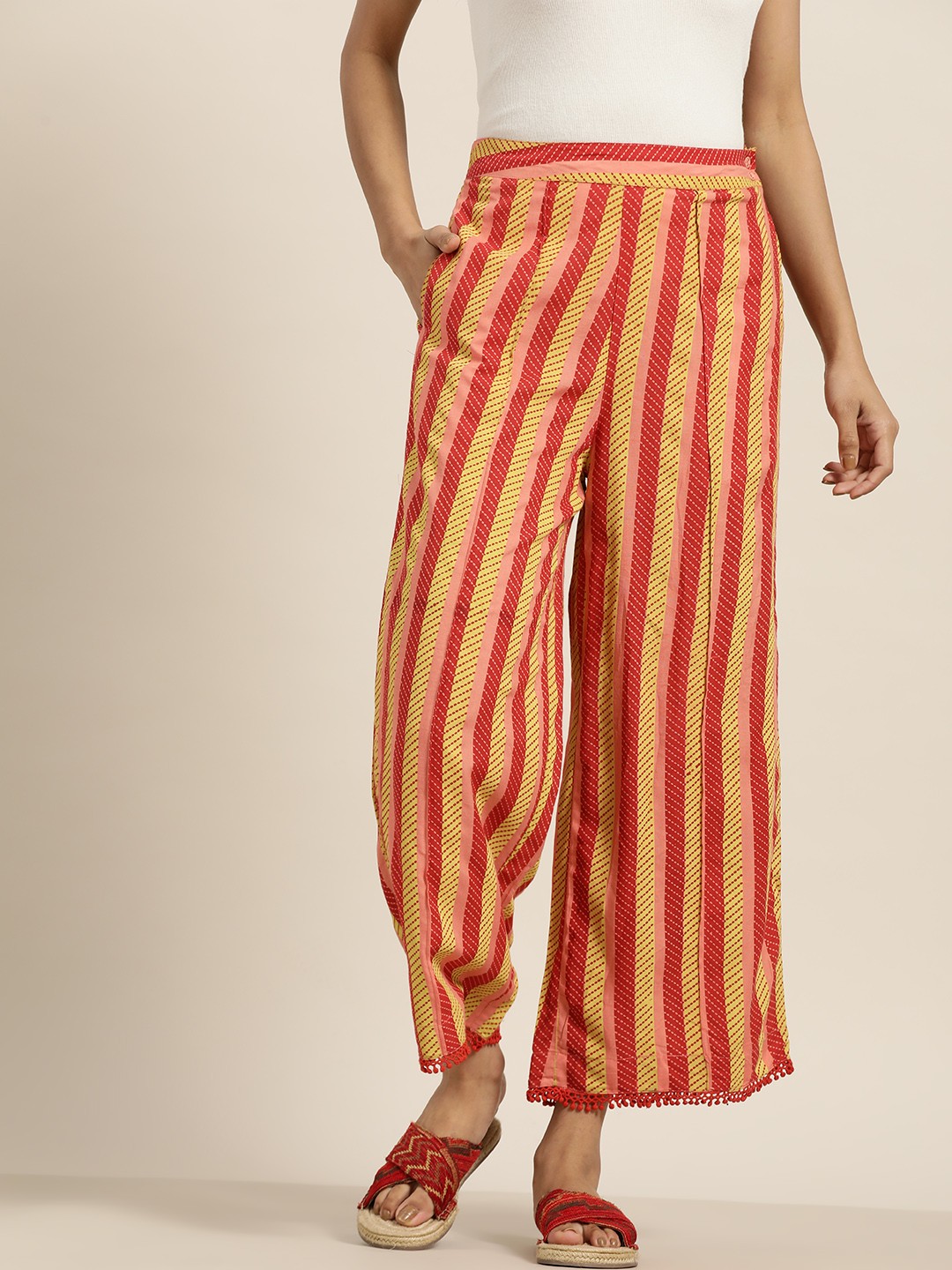 

Sangria Women Coral Red & Yellow Striped Straight Palazzos