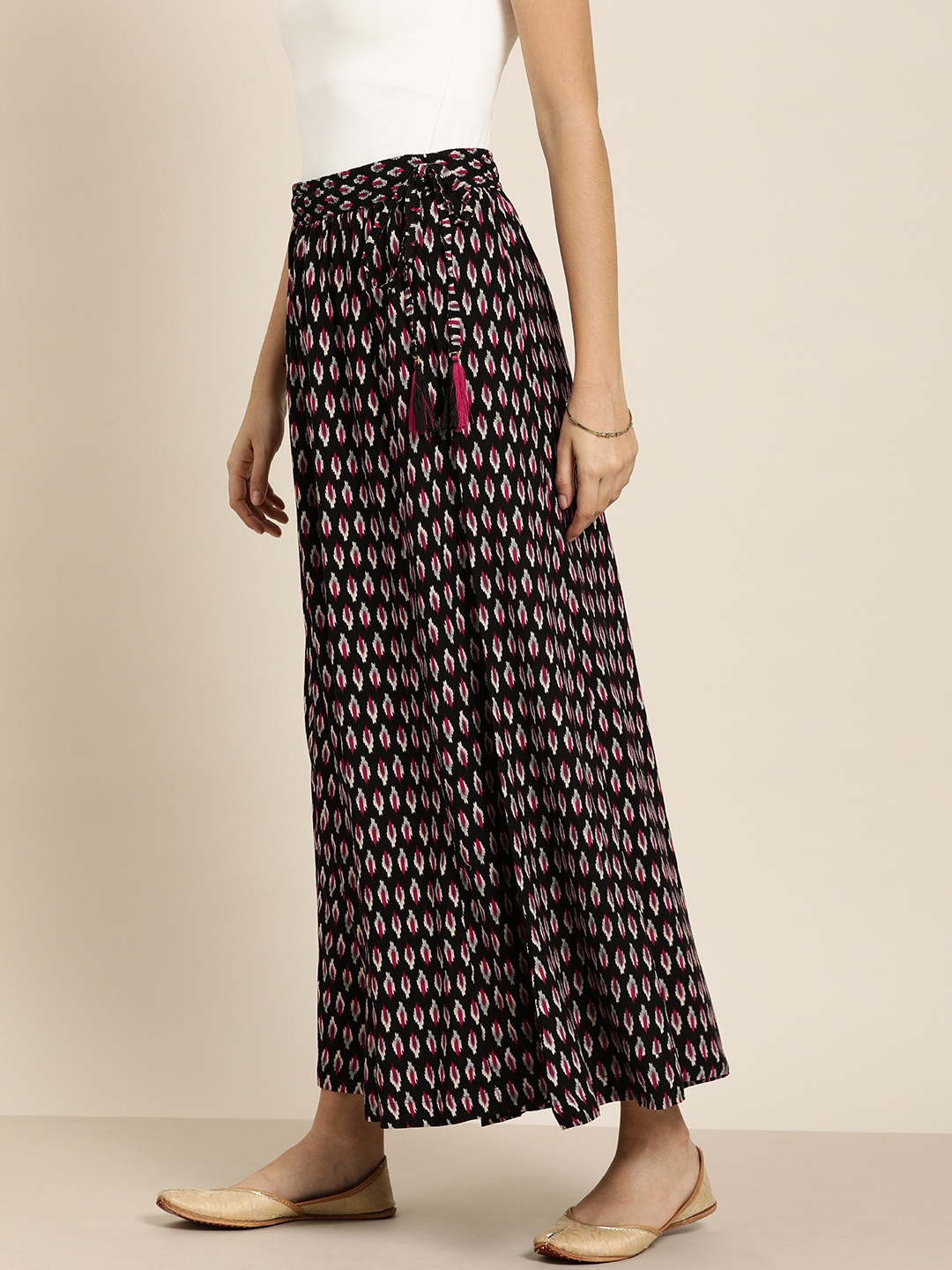 

Moda Rapido Women Black & Maroon Printed Flared Cropped Palazzos