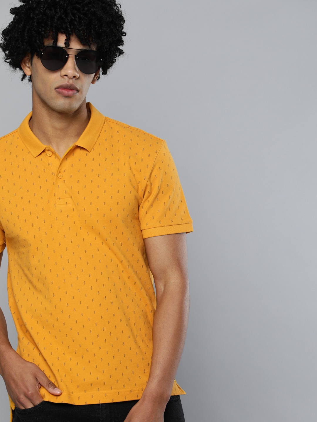 

Levis Men Mustard Yellow Printed Pure Cotton Polo Collar Pure Cotton T-shirt