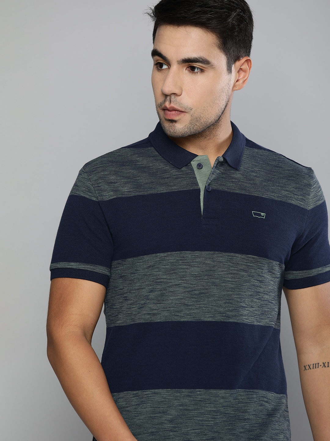 

Levis Men Navy Blue Striped Polo Collar Pure Cotton T-shirt