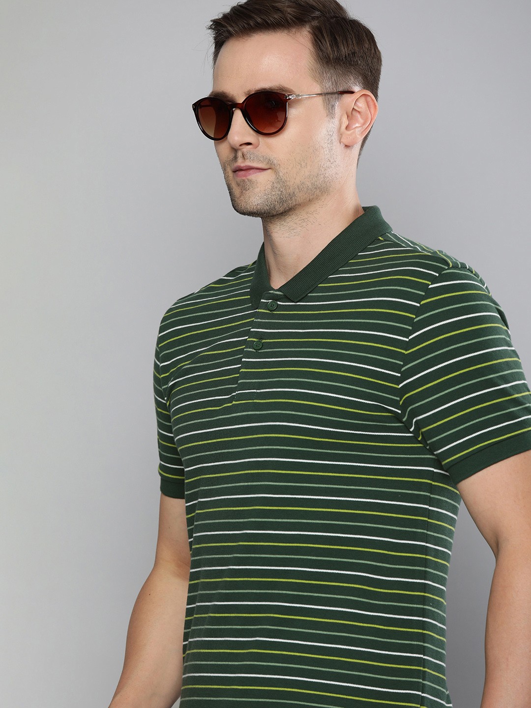 

Levis Men Green White Striped Polo Collar Pure Cotton T-shirt