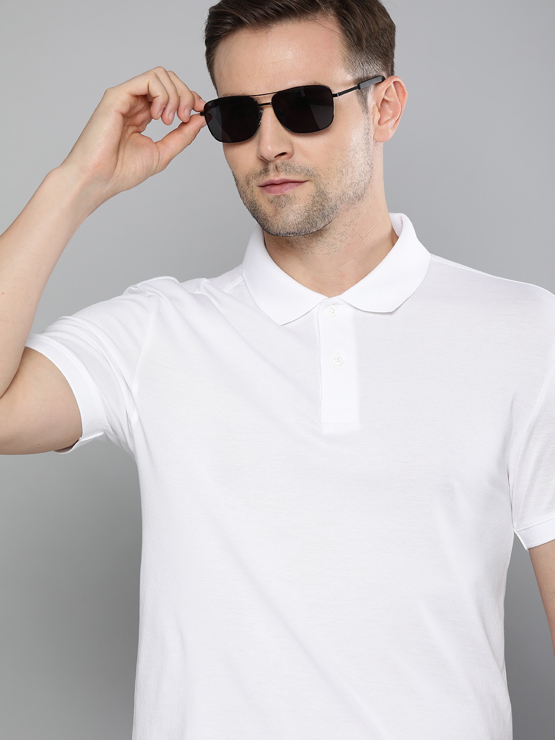 

Levis Men White Solid Polo Collar Pure Cotton T-shirt