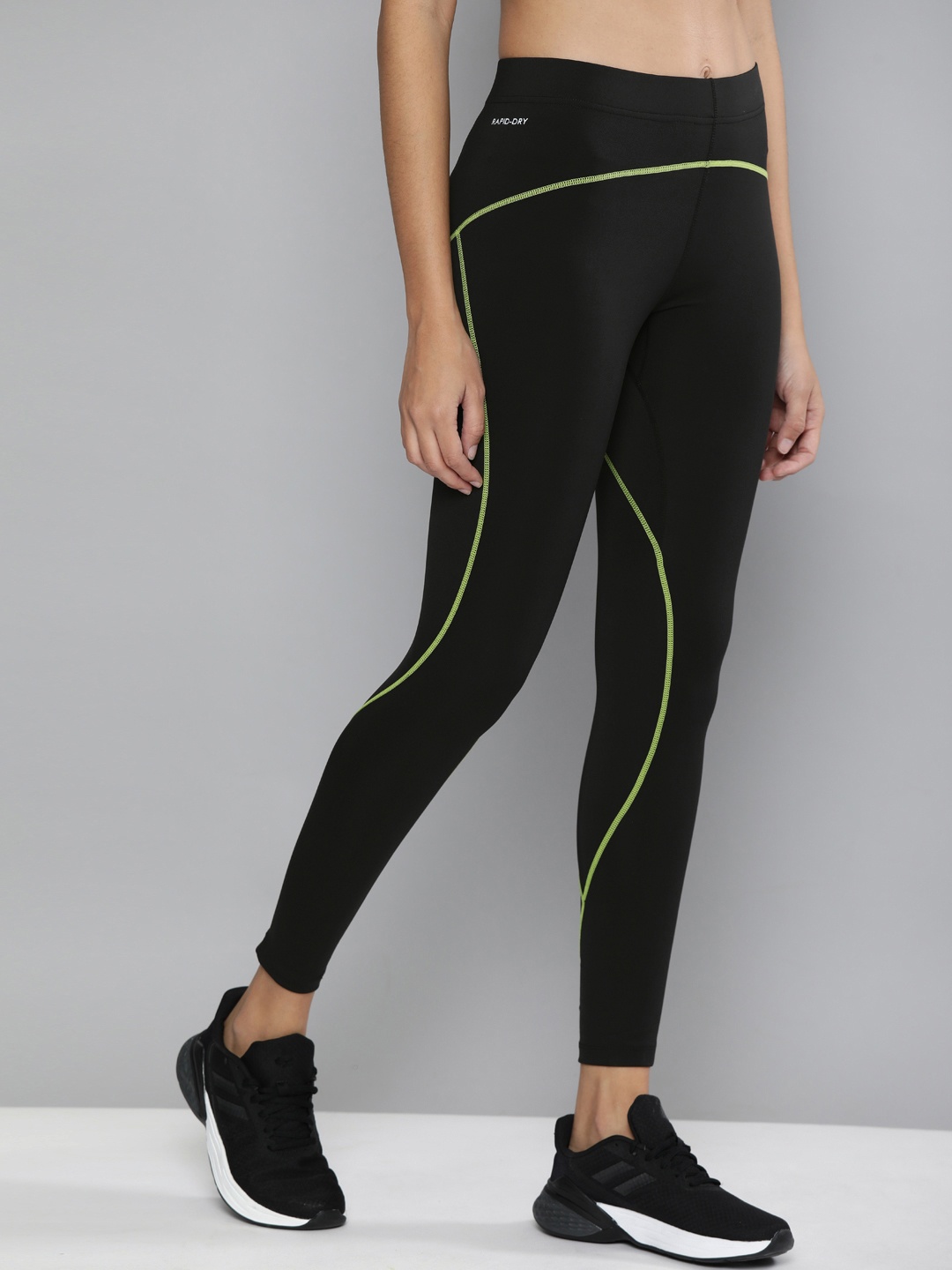 

HRX by Hrithik Roshan Women Black & Yellow Striped Running Tights