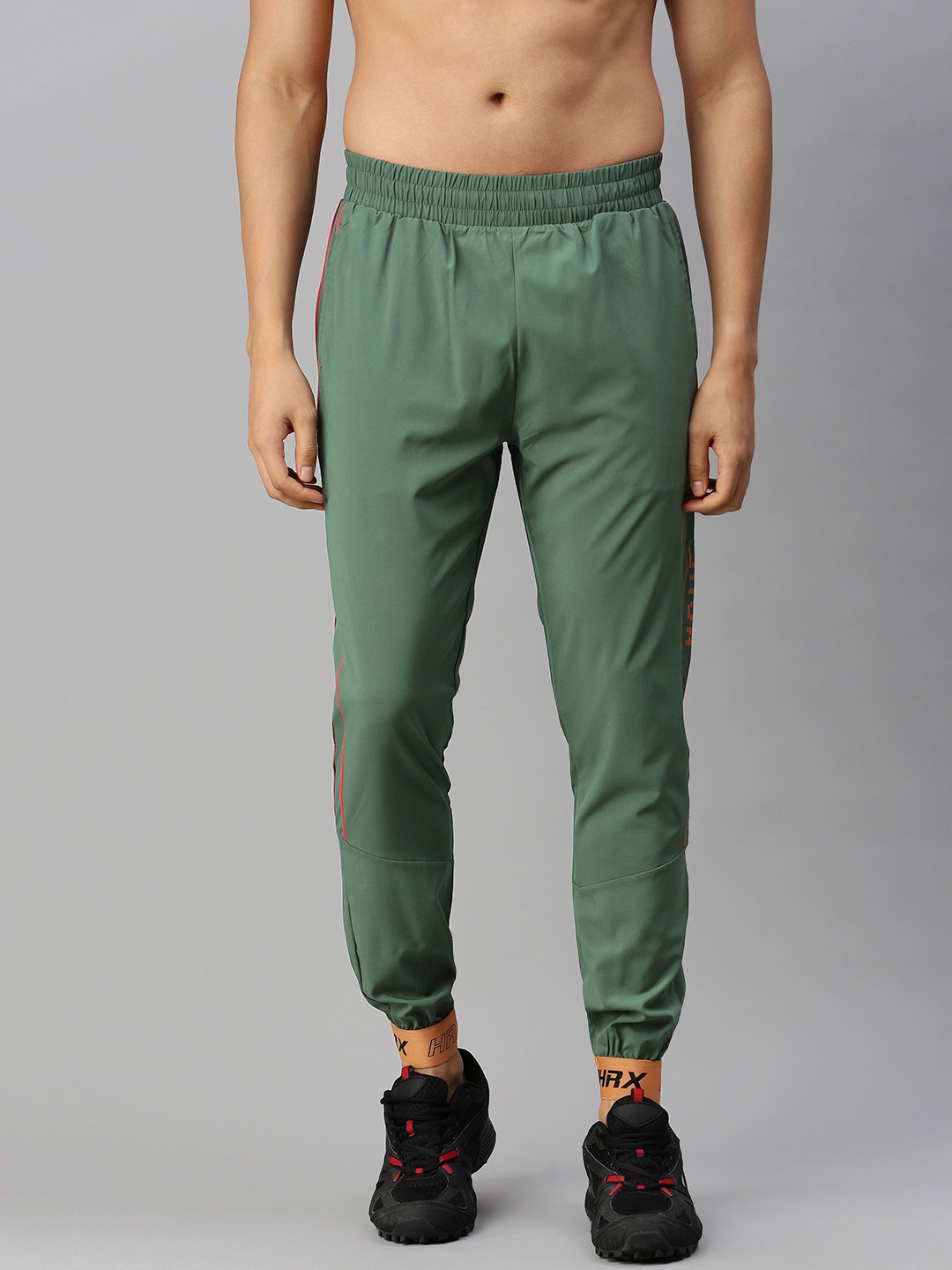 

HRX By Hrithik Roshan Men Black Forest Solid Slim Fit Mid Rise Rapid-Dry Running Joggers, Olive