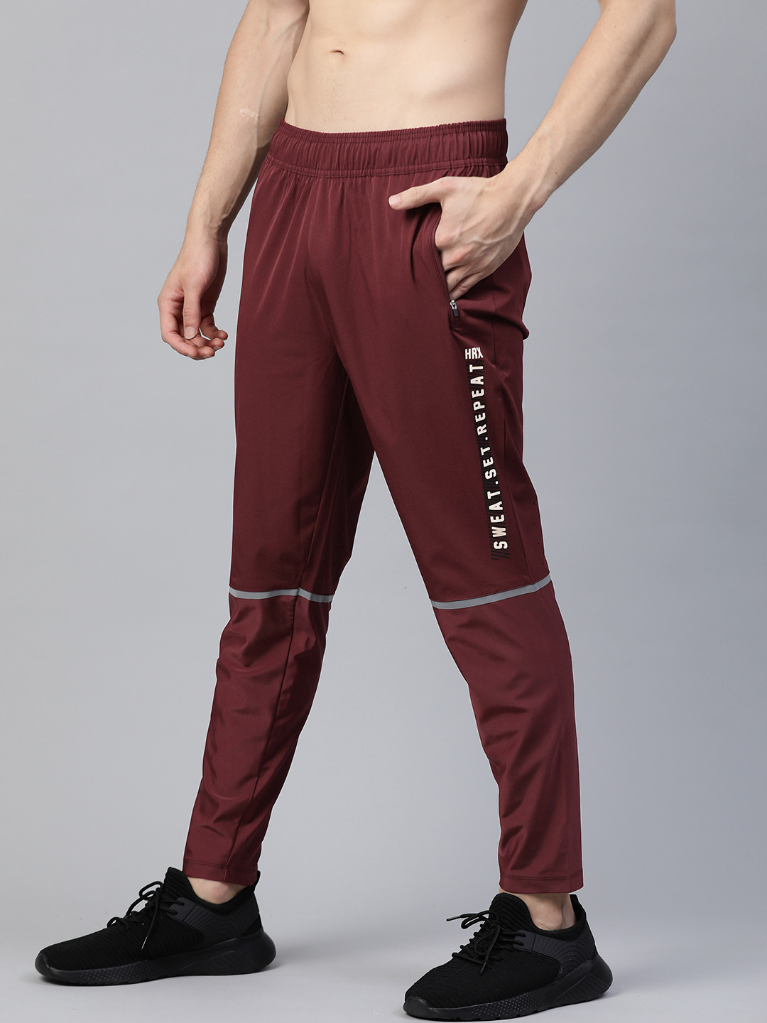 

HRX By Hrithik Roshan Men Zinfandel Typographic Hybrird Rapid-Dry Training Track Pants, Maroon