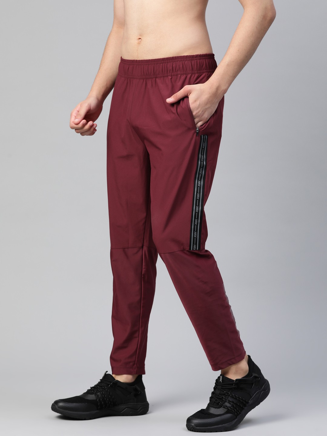 

HRX By Hrithik Roshan Men Zinfandel Solid Hybrird Mid-Rise Rapid-Dry Training Track Pants, Maroon