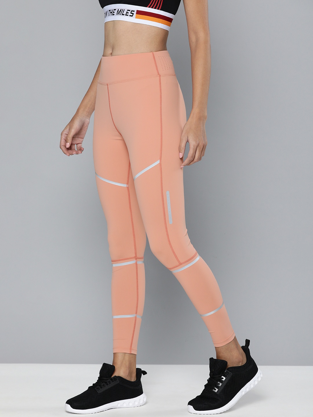 

HRX By Hrithik Roshan Women Jet Black Colourblock Skinny Fit Rapid-Dry Antimicrobial Running Tights, Peach