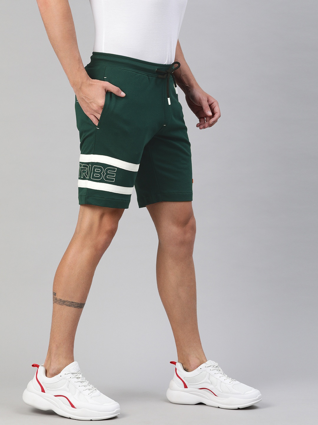 

Allen Solly Tribe Men Green Logo Printed Slim Fit Regular Shorts