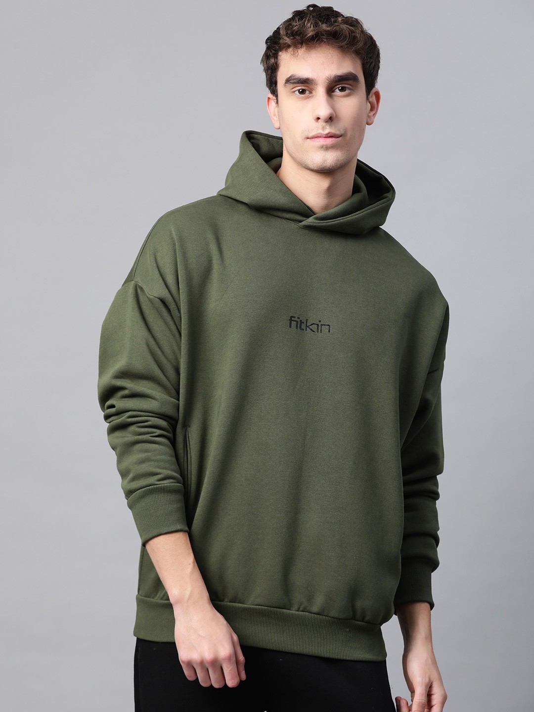 

Fitkin Men Olive Green & Black Solid Hooded Winter Sweatshirt With Brand Logo Print Detail