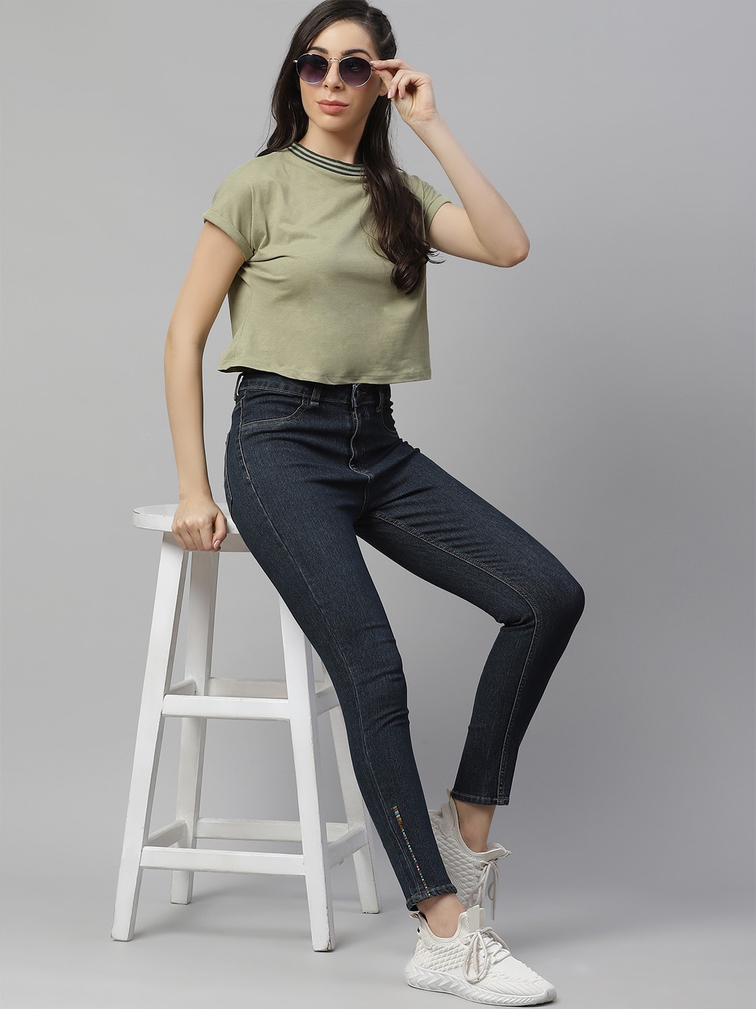 

The Roadster Lifestyle Co Women Navy Blue Super Skinny High-Rise Jeans with Hem Embroidery detail