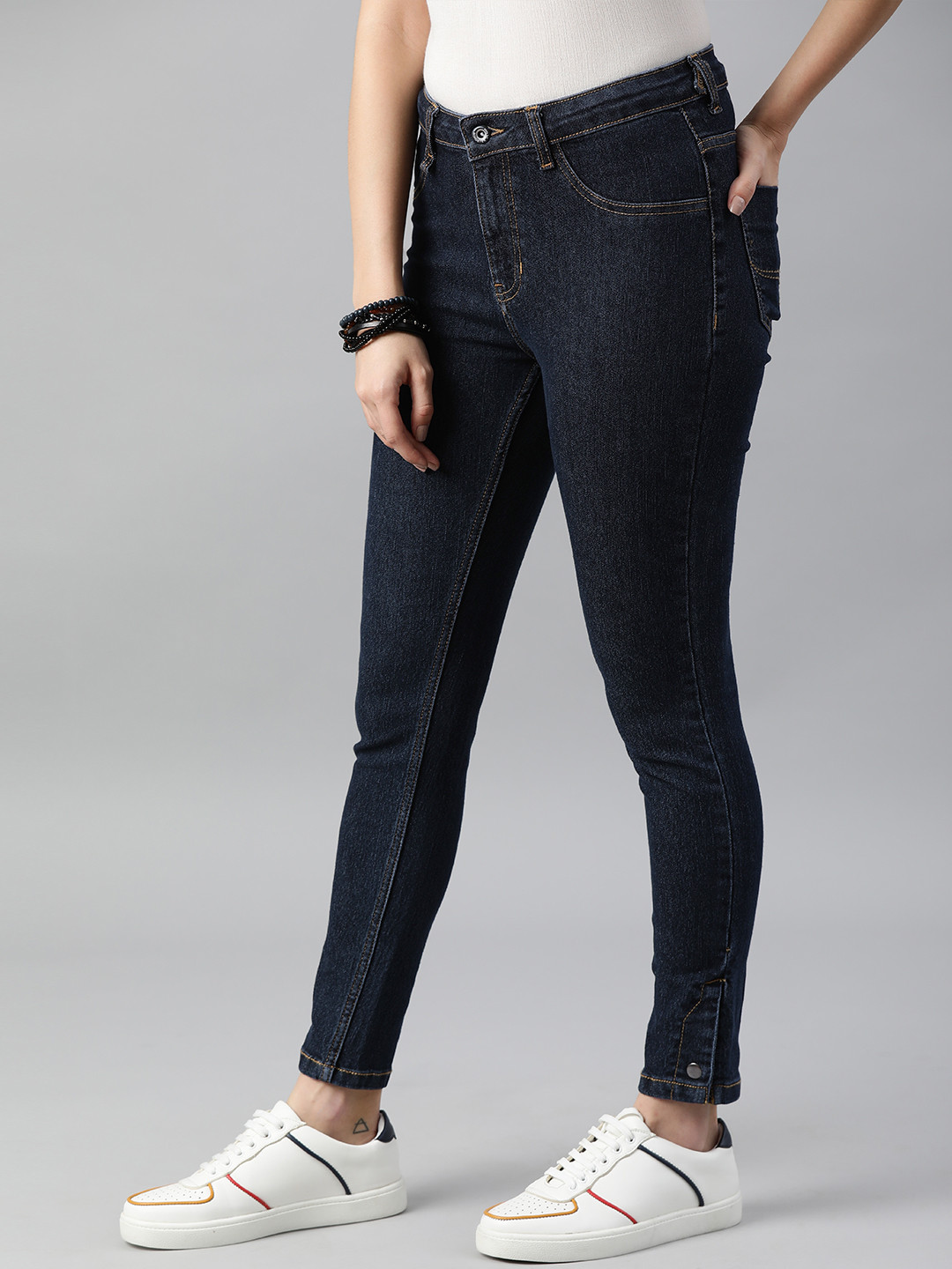 

The Roadster Lifestyle Co Women Blue Skinny Fit Stretchable Jeans with Hem Button Detail