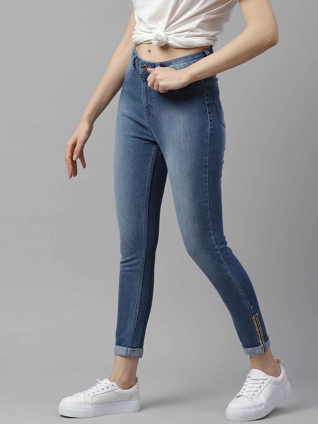 

Roadster Women Blue Super Skinny High rise Light Fade Jeans with Tape Hem Detail