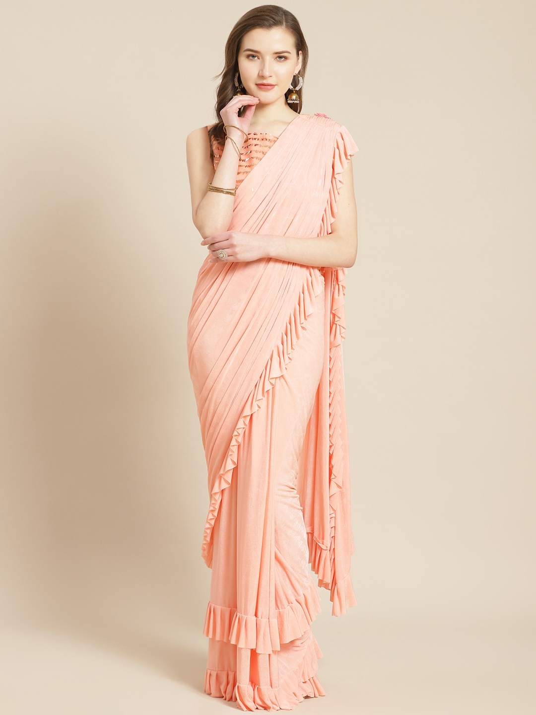 

Kalista Peach-Coloured Solid Ruffled Detail Ready To Wear Saree