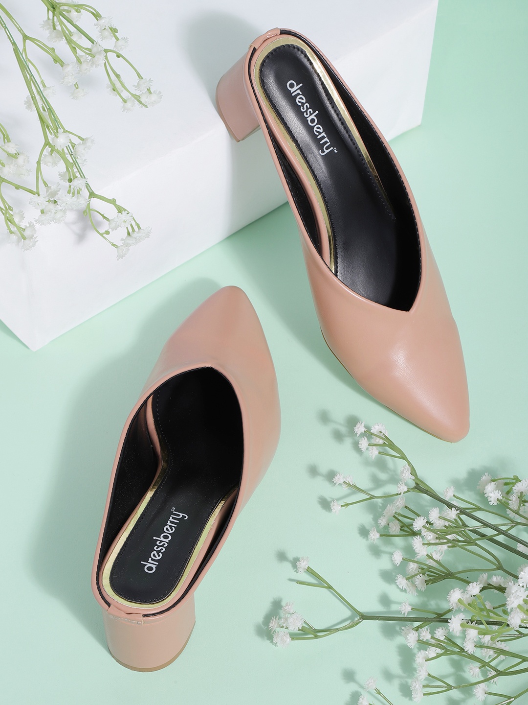 

DressBerry Women Peach-Coloured Solid Heeled Mules