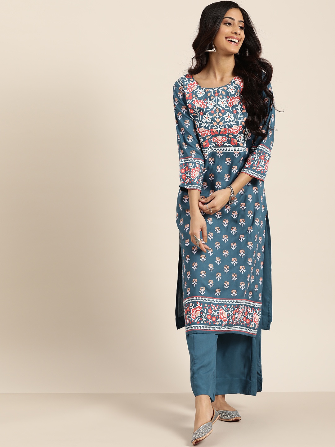 

Sangria Women Teal Blue & White Printed Kurta with Palazzos