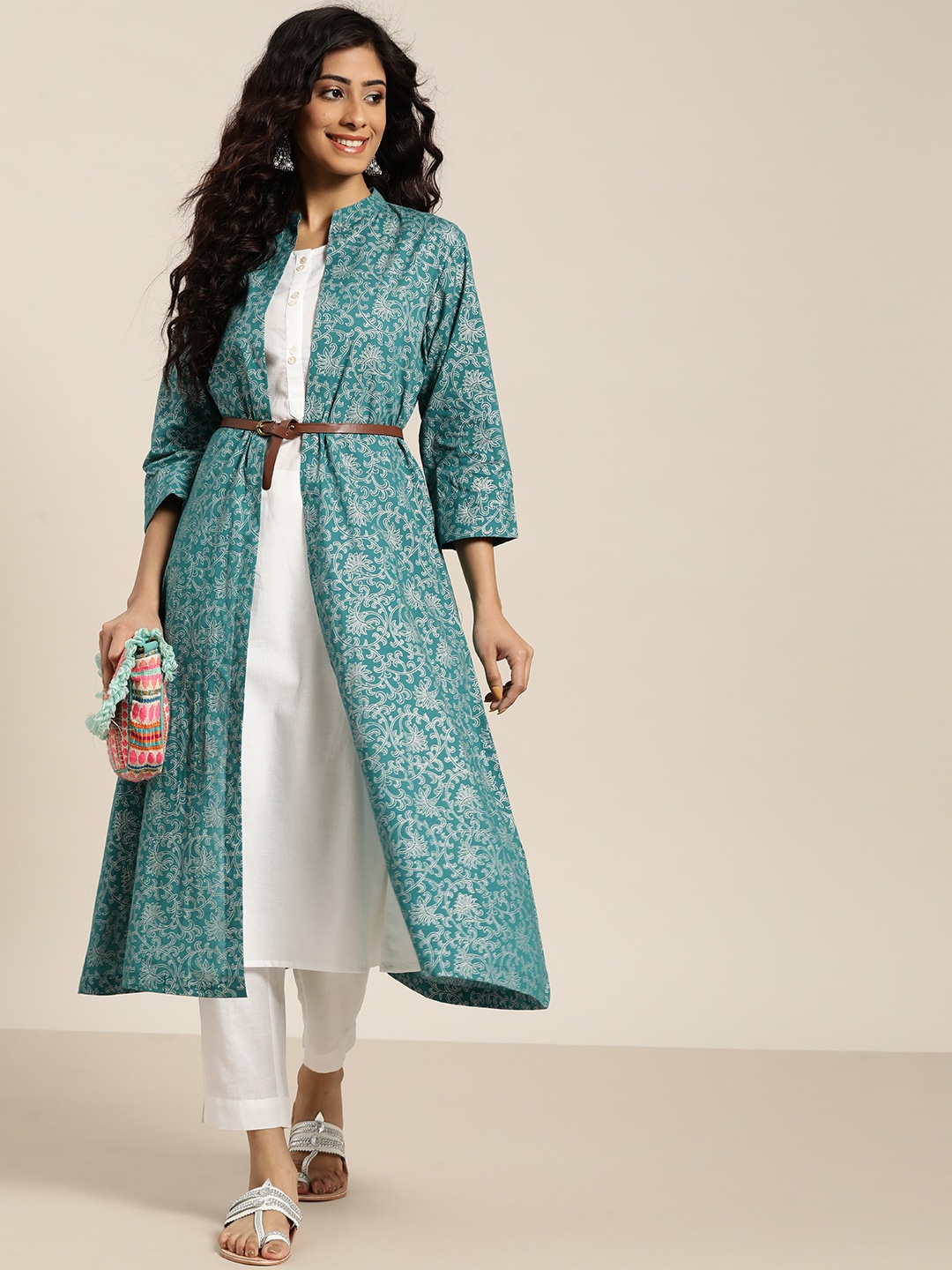 

Sangria Teal Green & White Cotton Solid Kurta with Trousers & Longline Ethnic Jacket