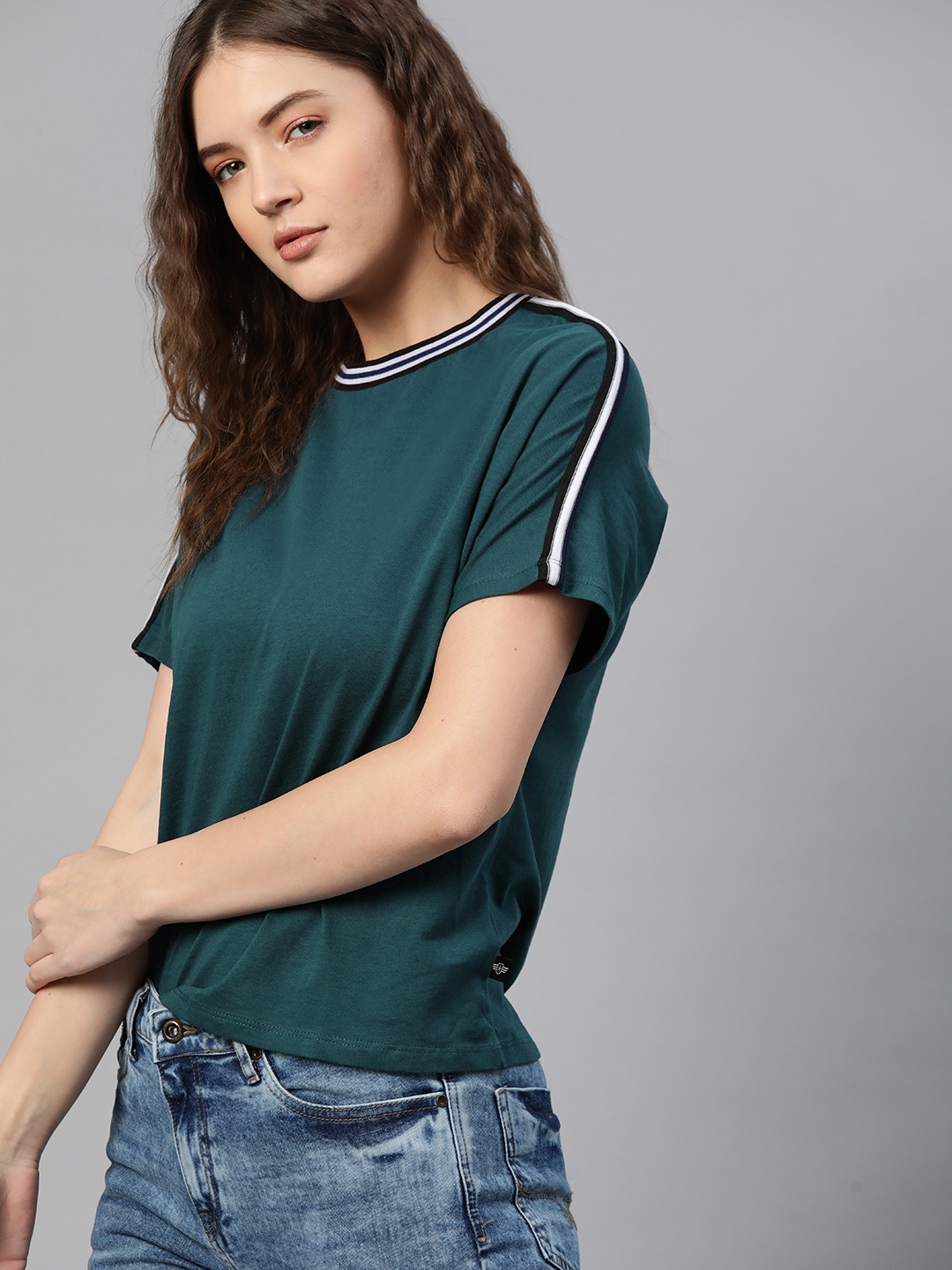 

The Roadster Lifestyle Co Teal Green Solid Pure Cotton Extended Sleeves Regular Top