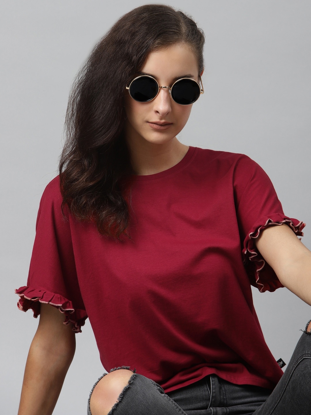 

The Roadster Lifestyle Co Maroon Cotton Loose Fit Extended Sleeves Solid Top