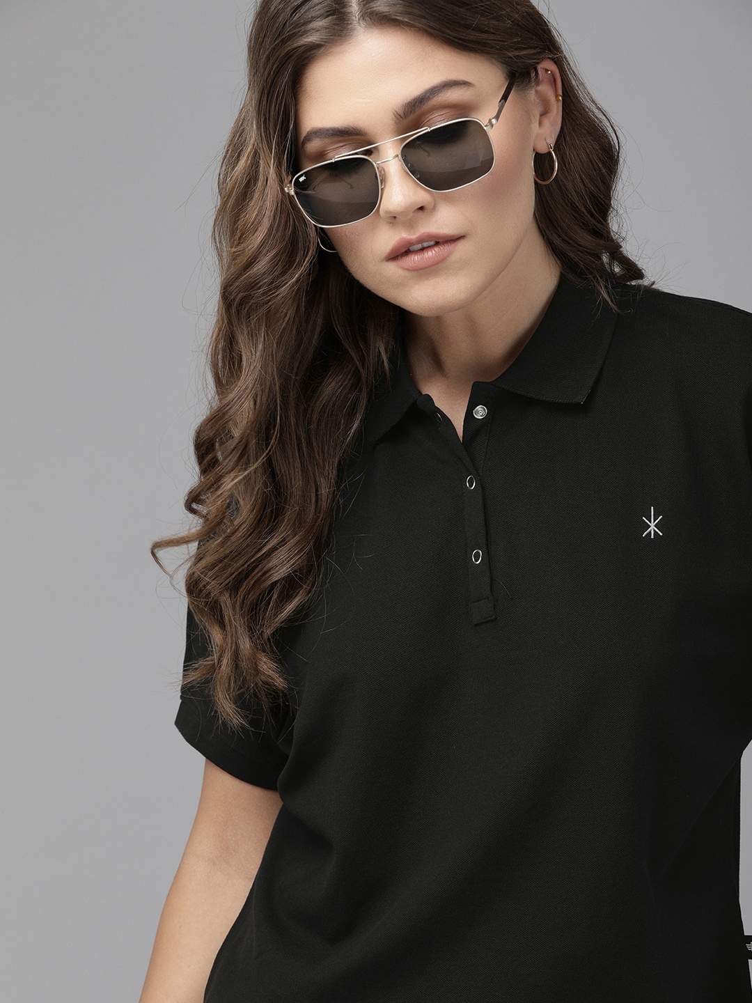 

The Roadster Lifestyle Co Women Black Boxy Fit Solid Polo Collar T-shirt