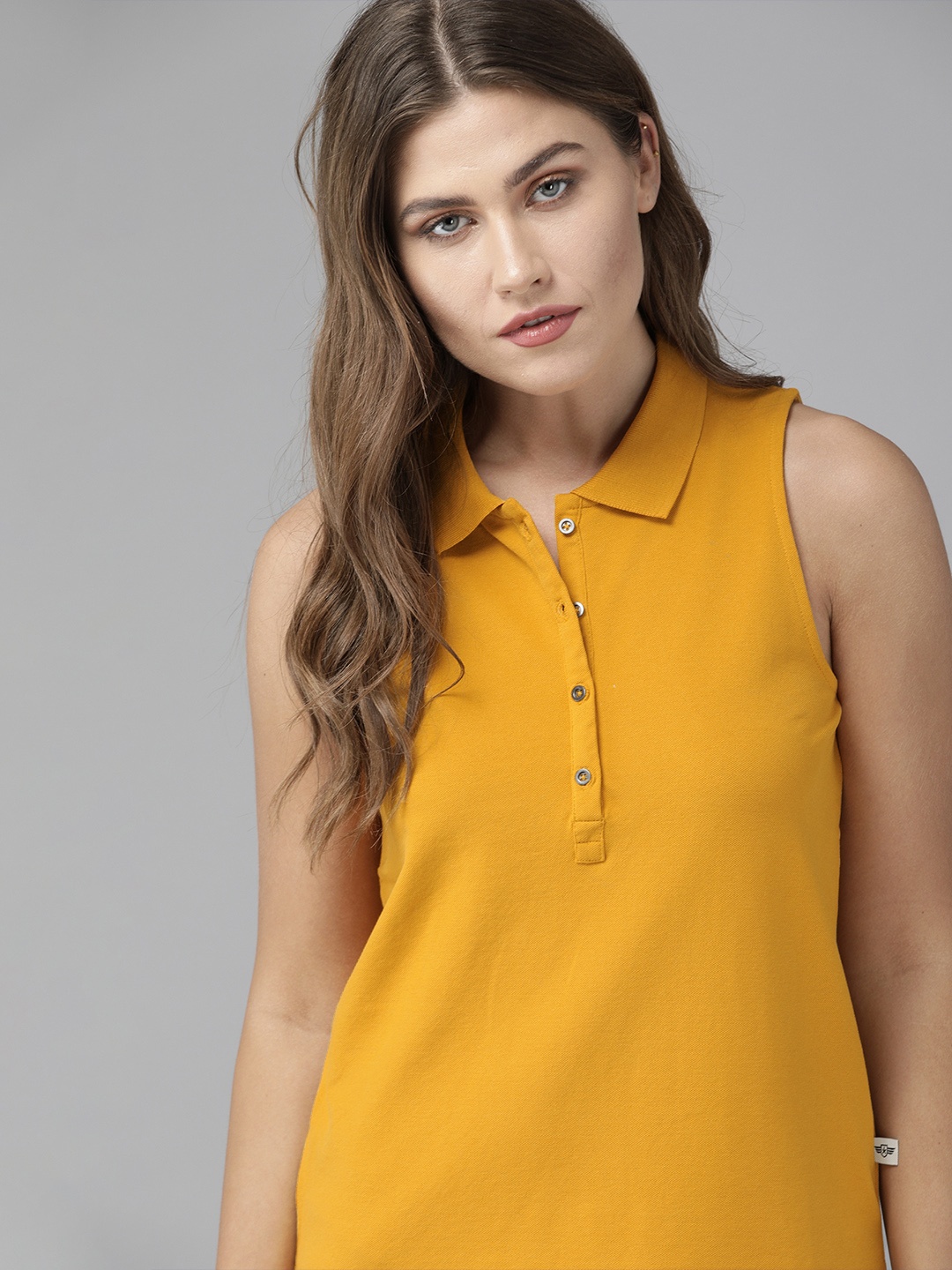 

The Roadster Lifestyle Co Women Mustard Yellow Solid Polo Collar Pure Cotton T-shirt