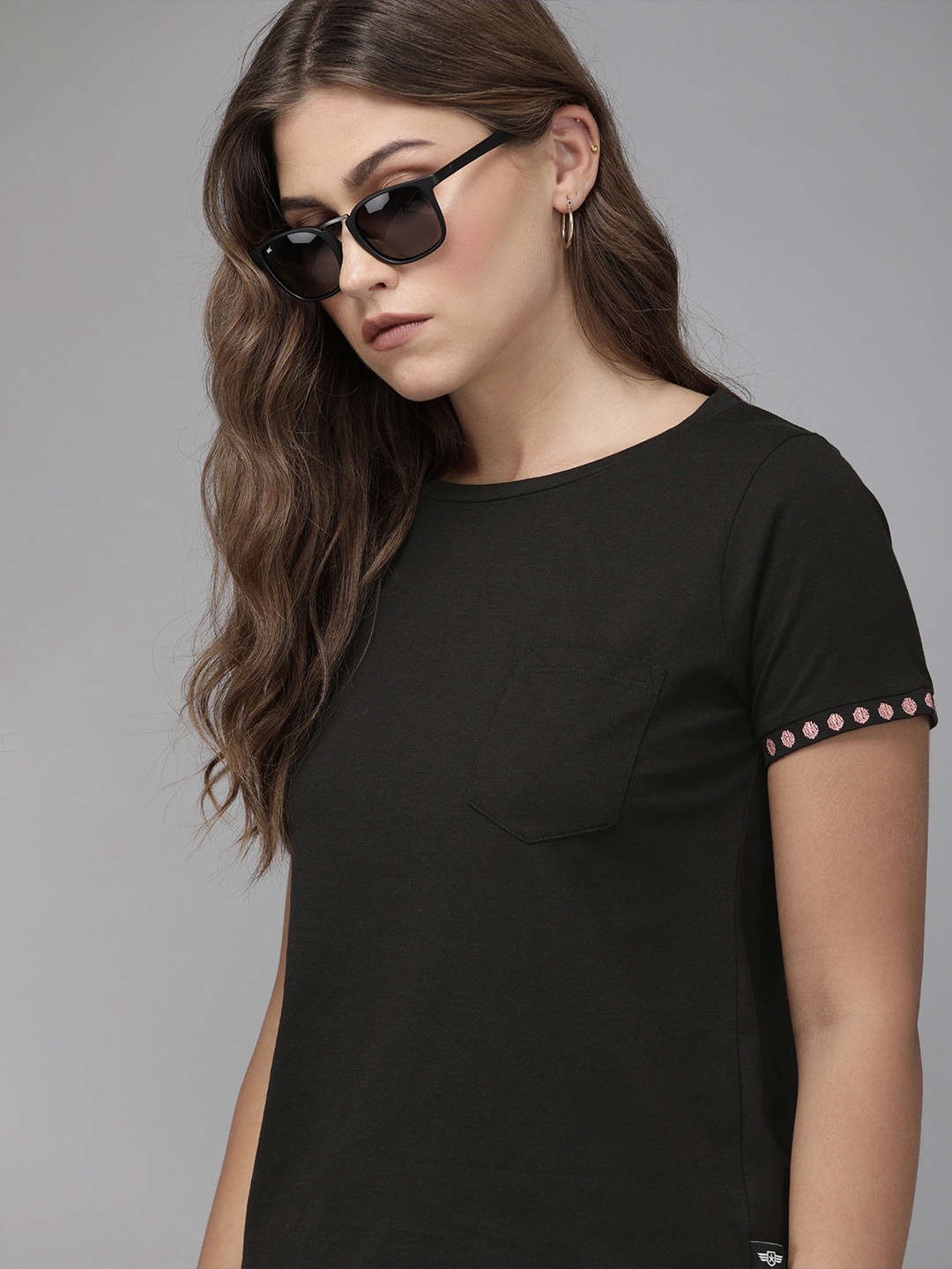 

The Roadster Lifestyle Co Women Black Solid Round Neck T-shirt with Pocket Detailing