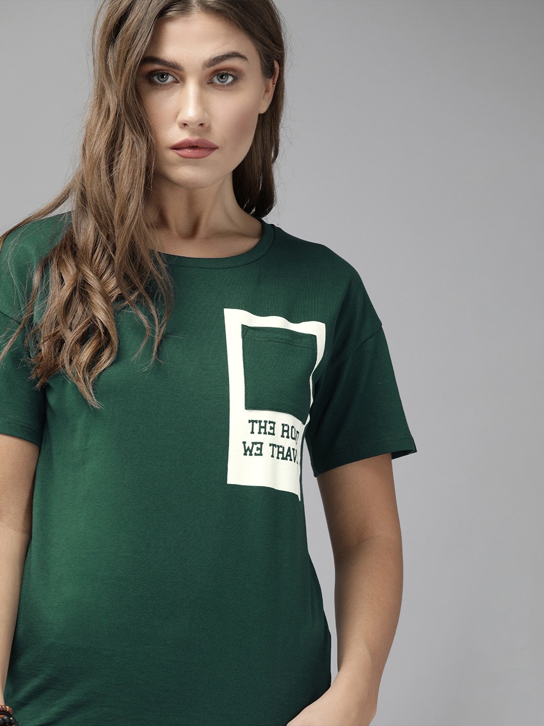 

The Roadster Lifestyle Co Women Green Solid Round Neck Contrast Pocket Detailing Pure Cotton T-shirt