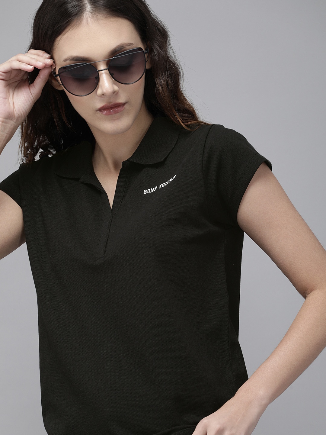 

The Roadster Lifestyle Co Women Black Solid Polo Collar T-shirt