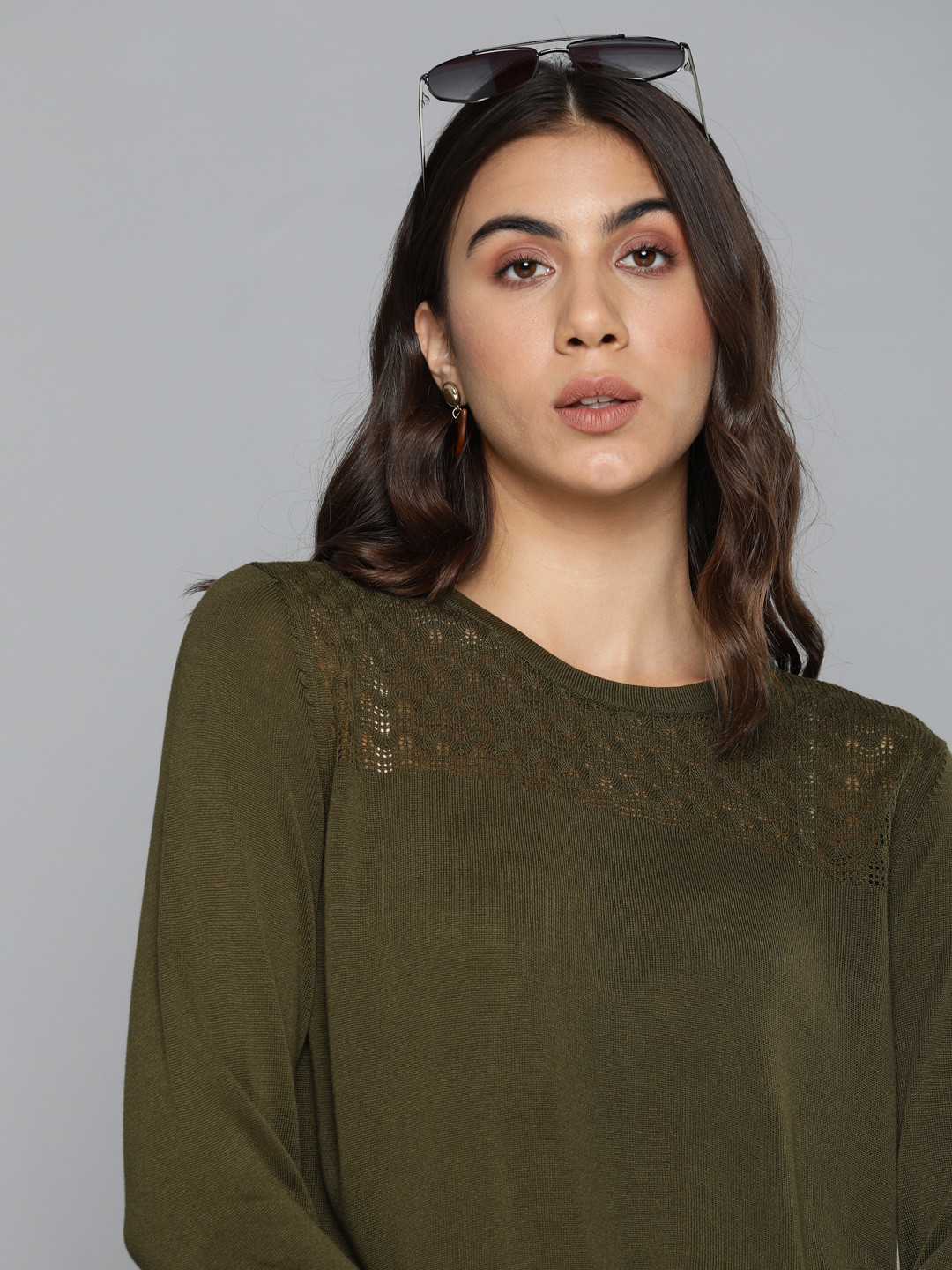 

Levis Women Olive Green Self Design Round Neck T-shirt