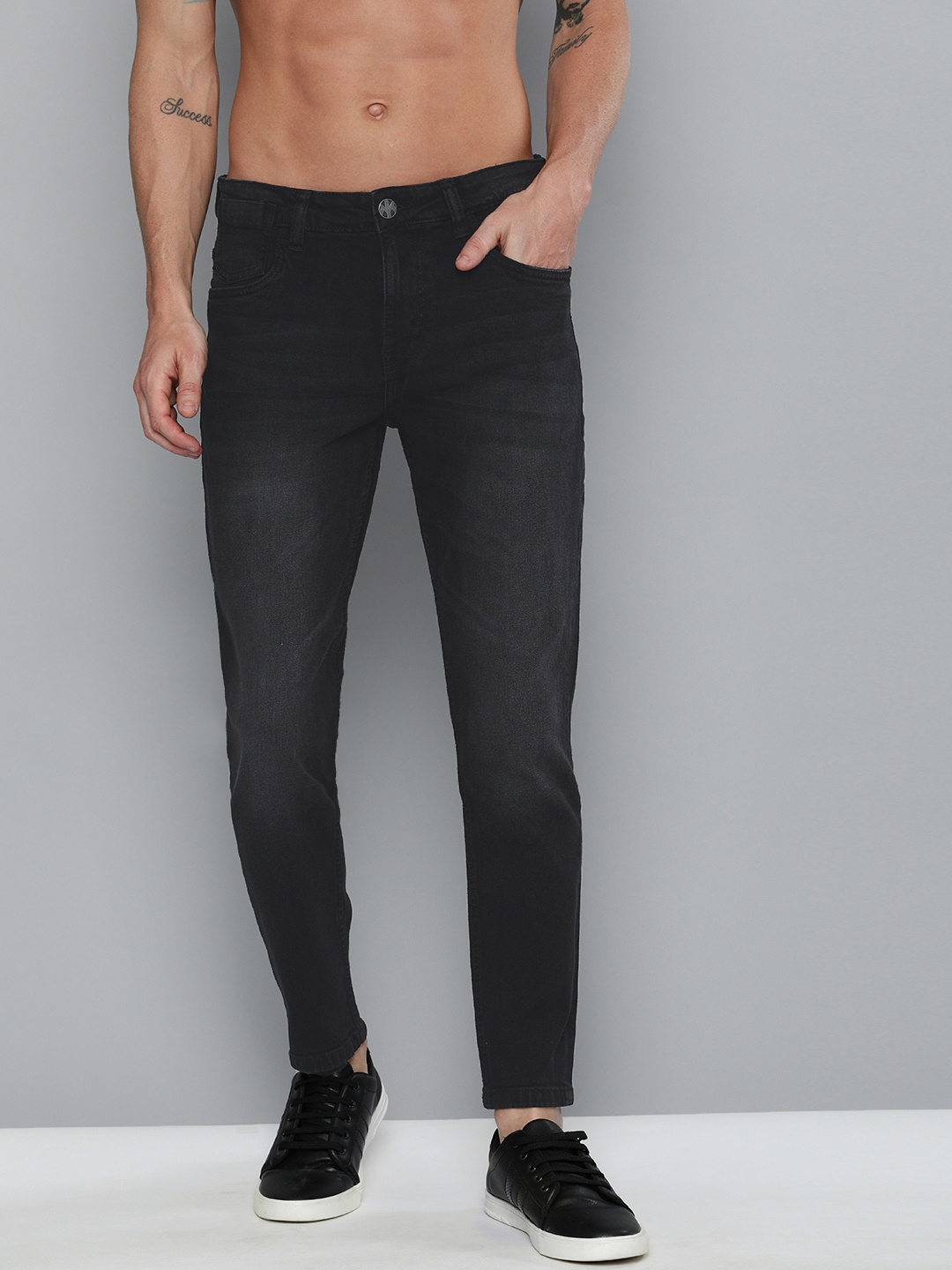 

Kook N Keech Men Black Tapered Fit Mid-Rise Clean Look Stretchable Jeans